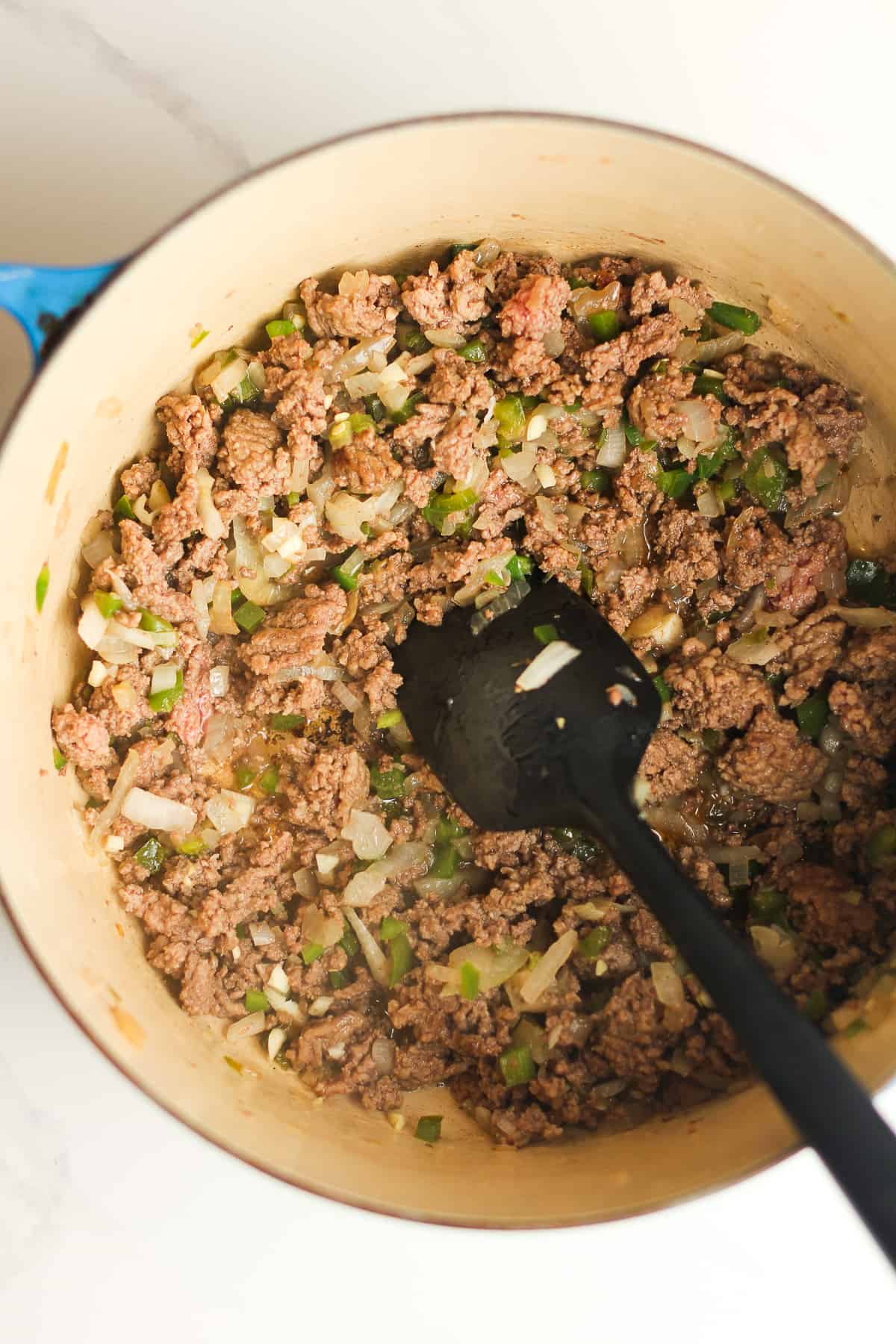 A pot of the ground beef and veggies.