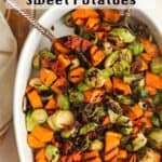 A dish of balsamic glazed Brussels sprouts and sweet potatoes.