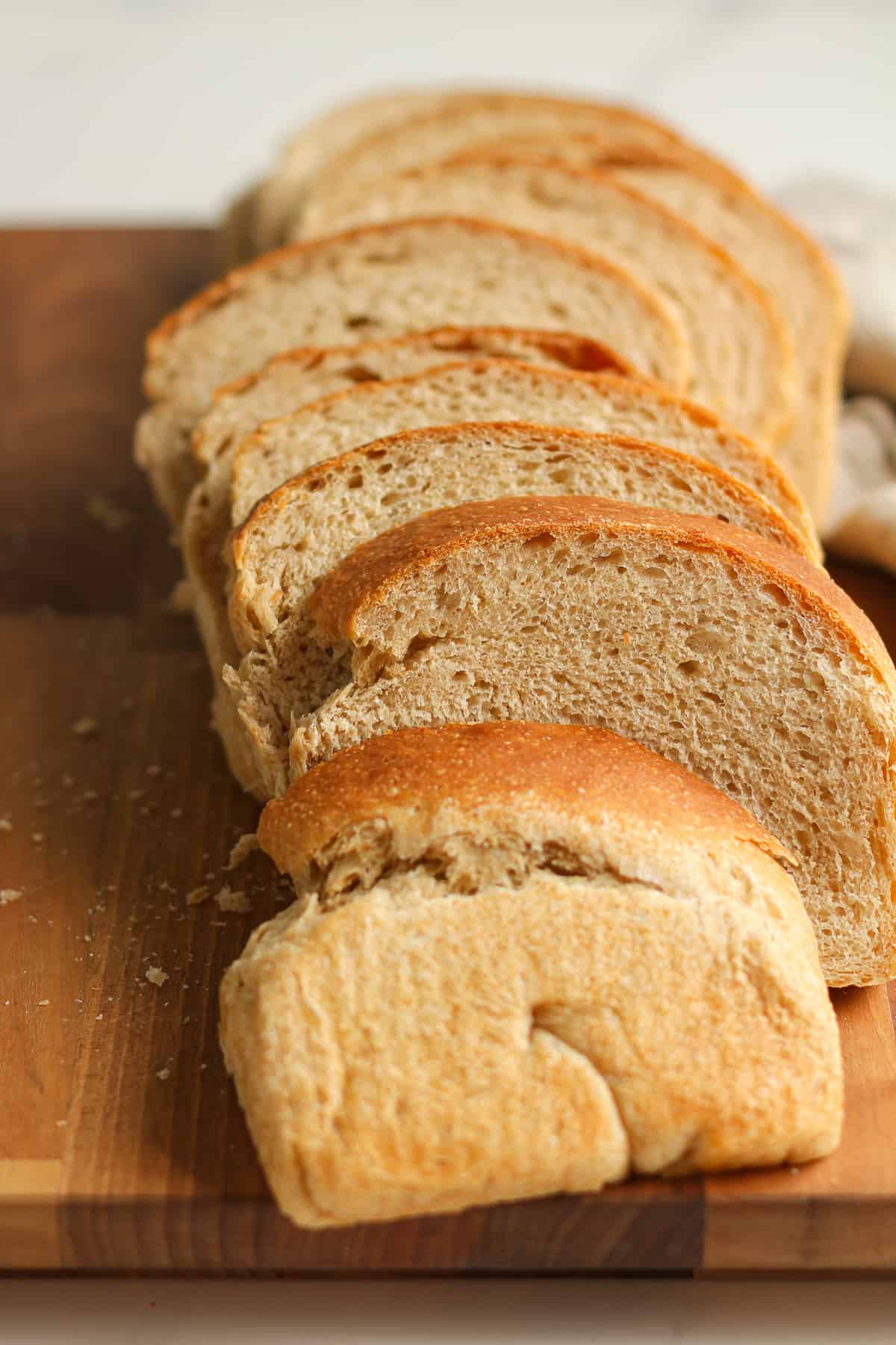 Side shot of sliced sourdough whole wheat bread.