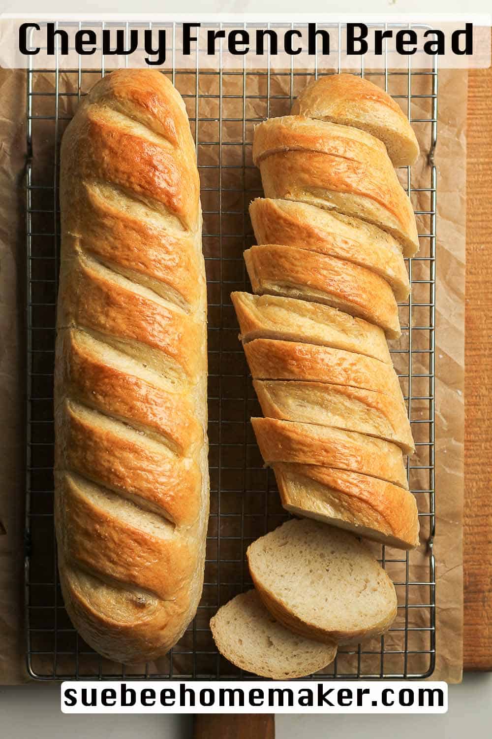 A large loaf of French bread and another one sliced.