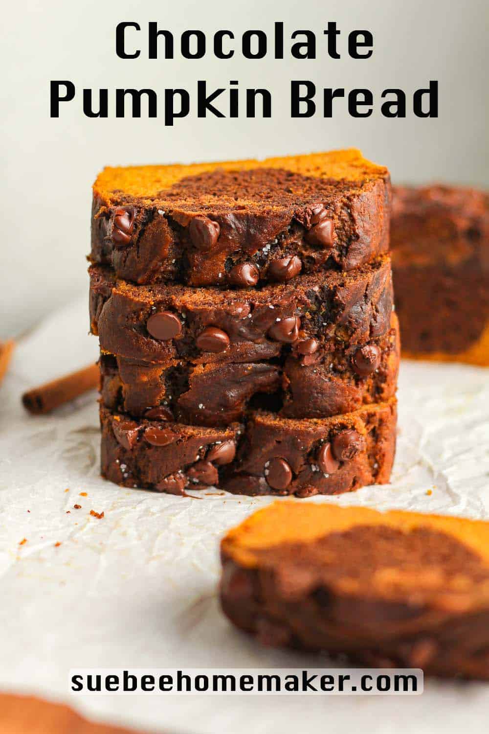 A stack of four slices of chocolate pumpkin bread.