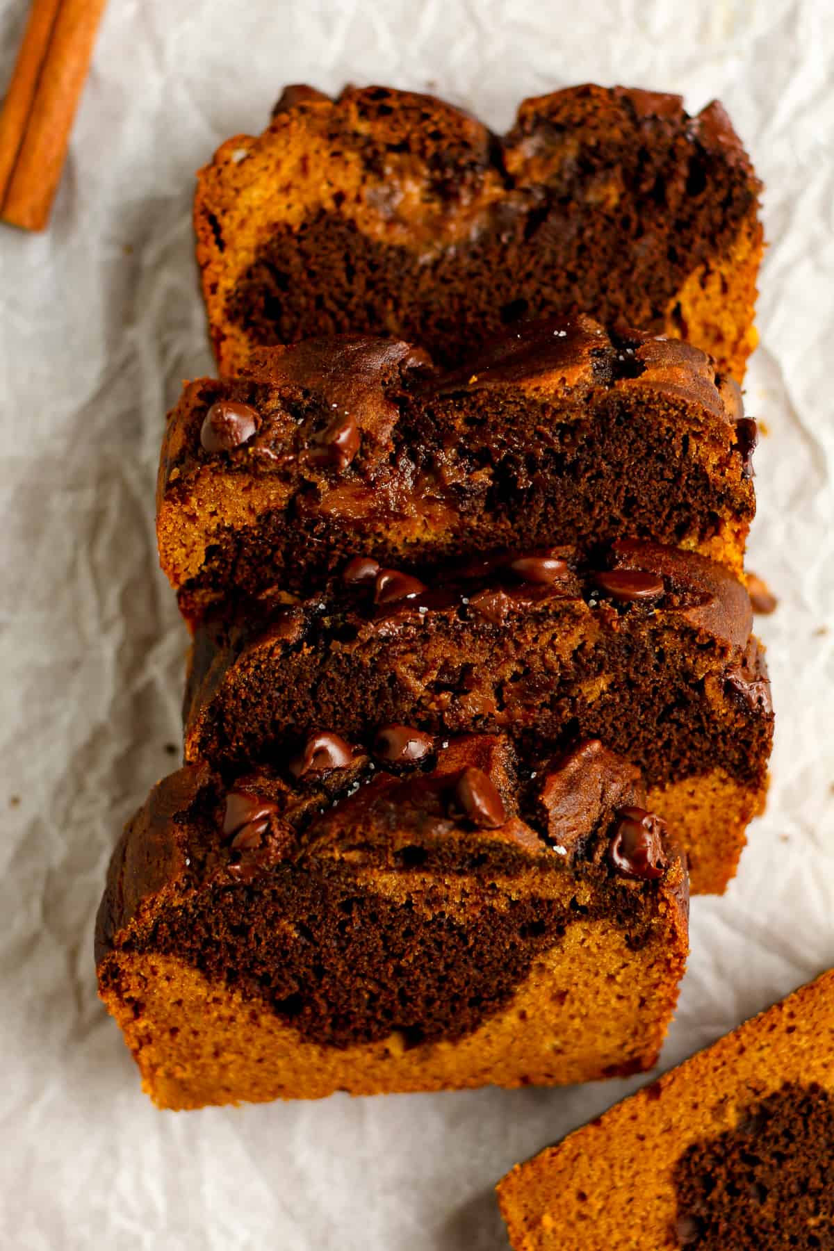 Four slices of chocolate pumpkin bread.