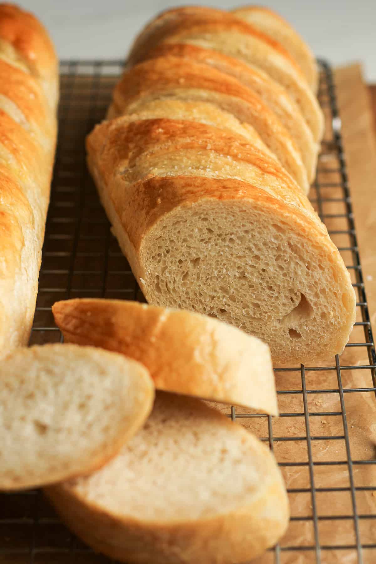 Side shot of a loaf of sliced bread.