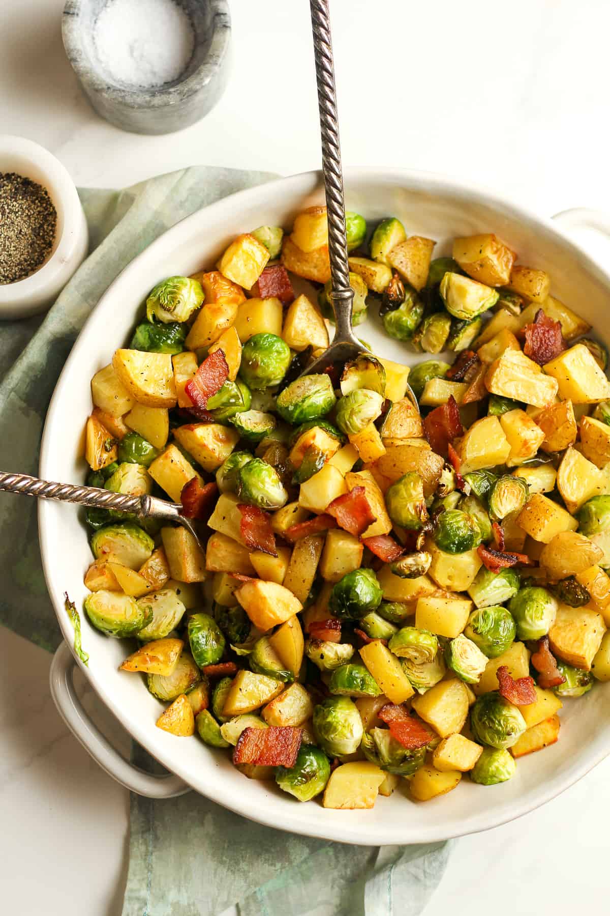 A bowl of the roasted veggies with bacon.
