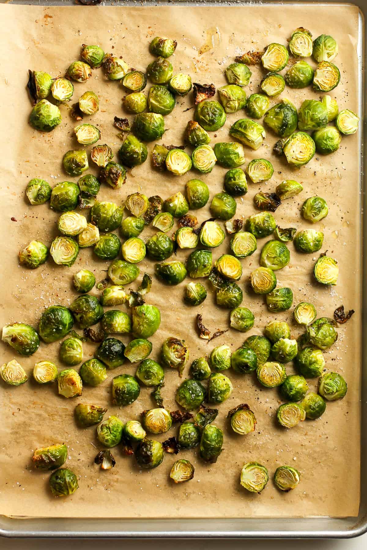 The Roasted Brussels sprouts on a sheet pan.