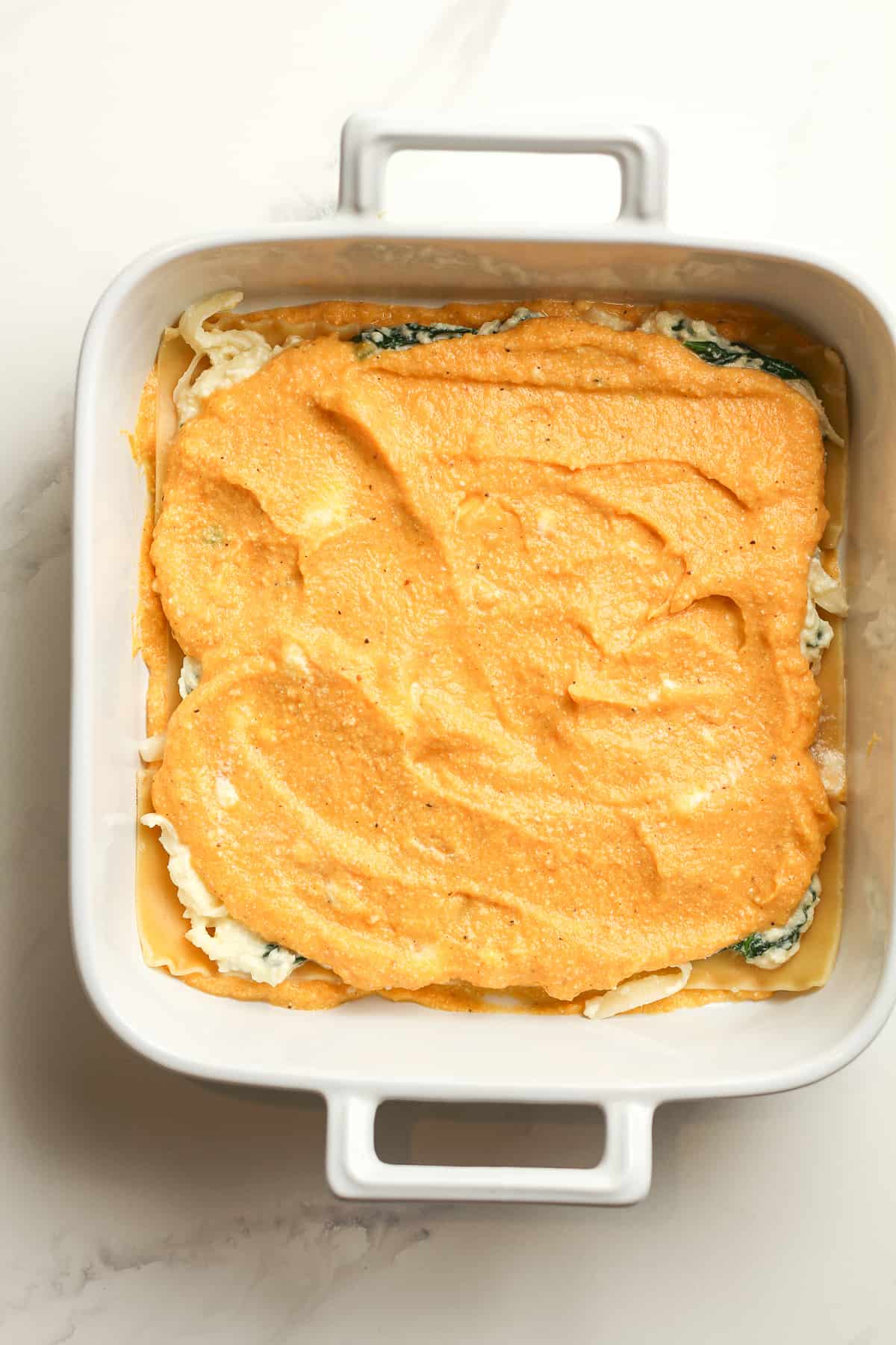The layers of lasagna, showing the pureed squash layer.