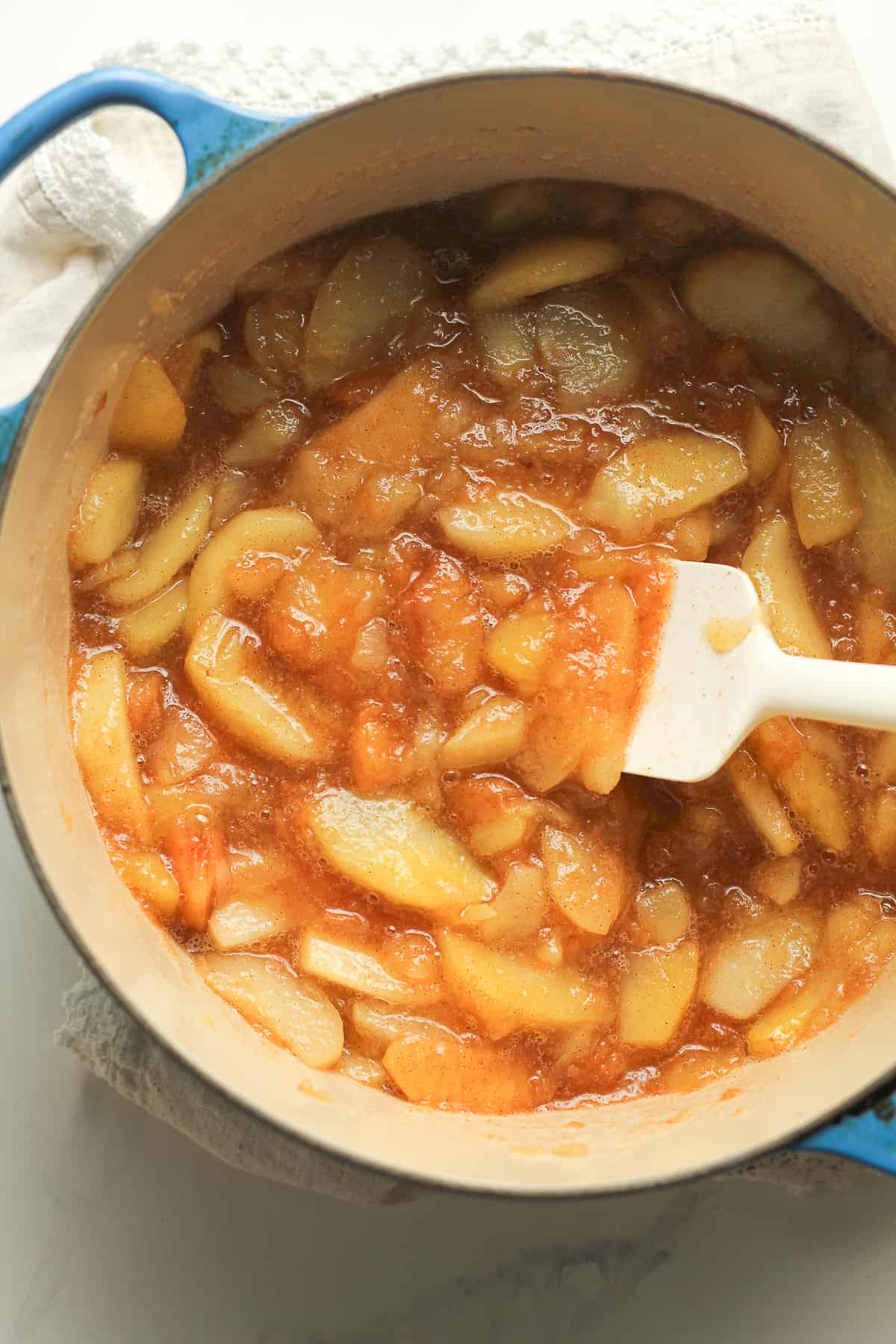 A stock pot of just cooked homemade cinnamon applesauce.