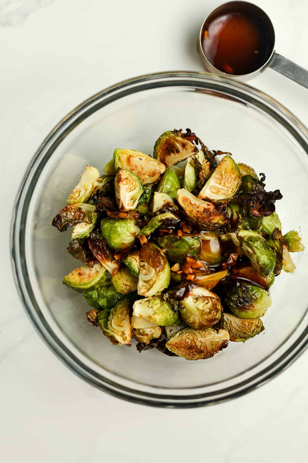 The cooked Brussels with teriyaki sauce on top.