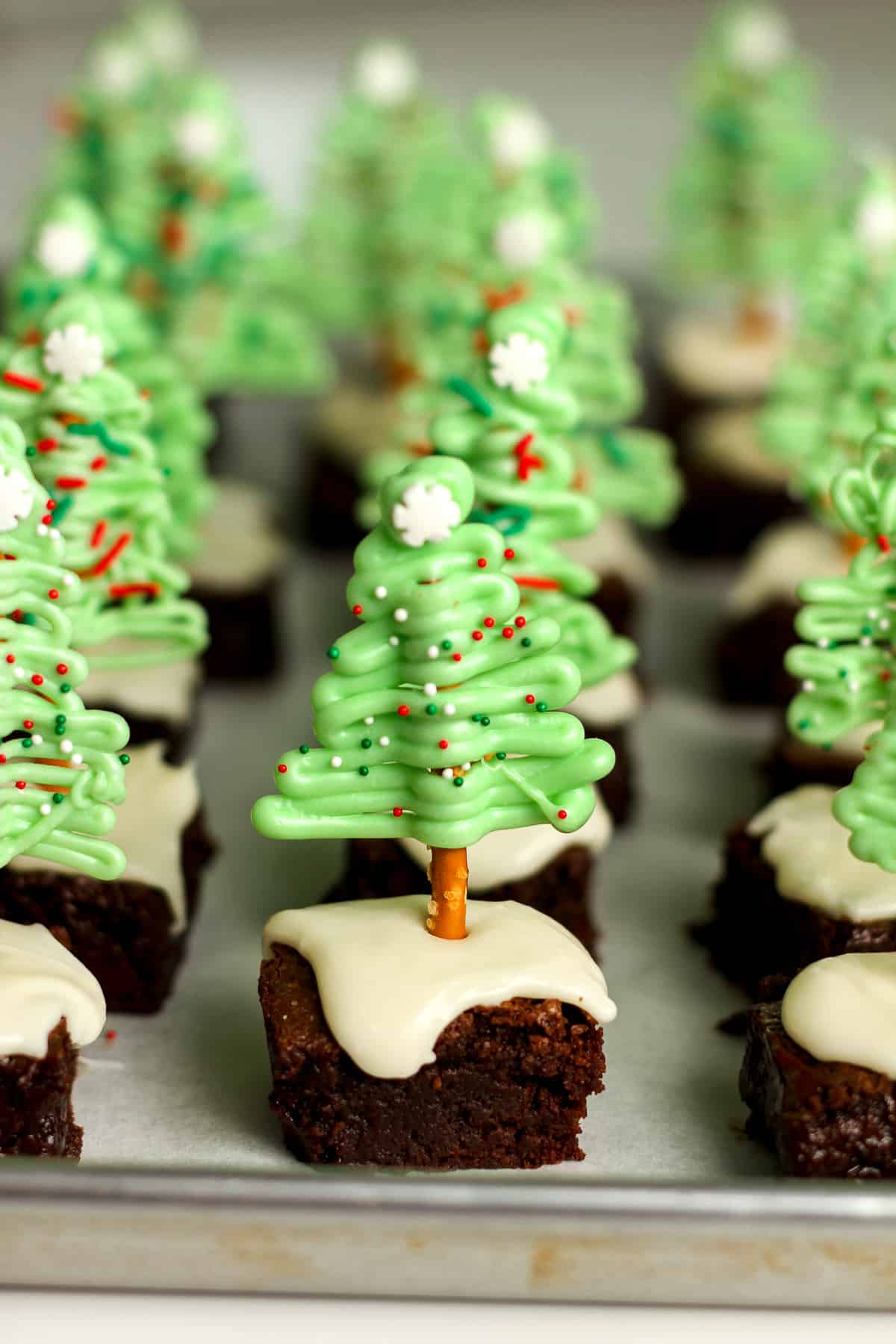 The Christmas trees on brownies on a baking sheet.