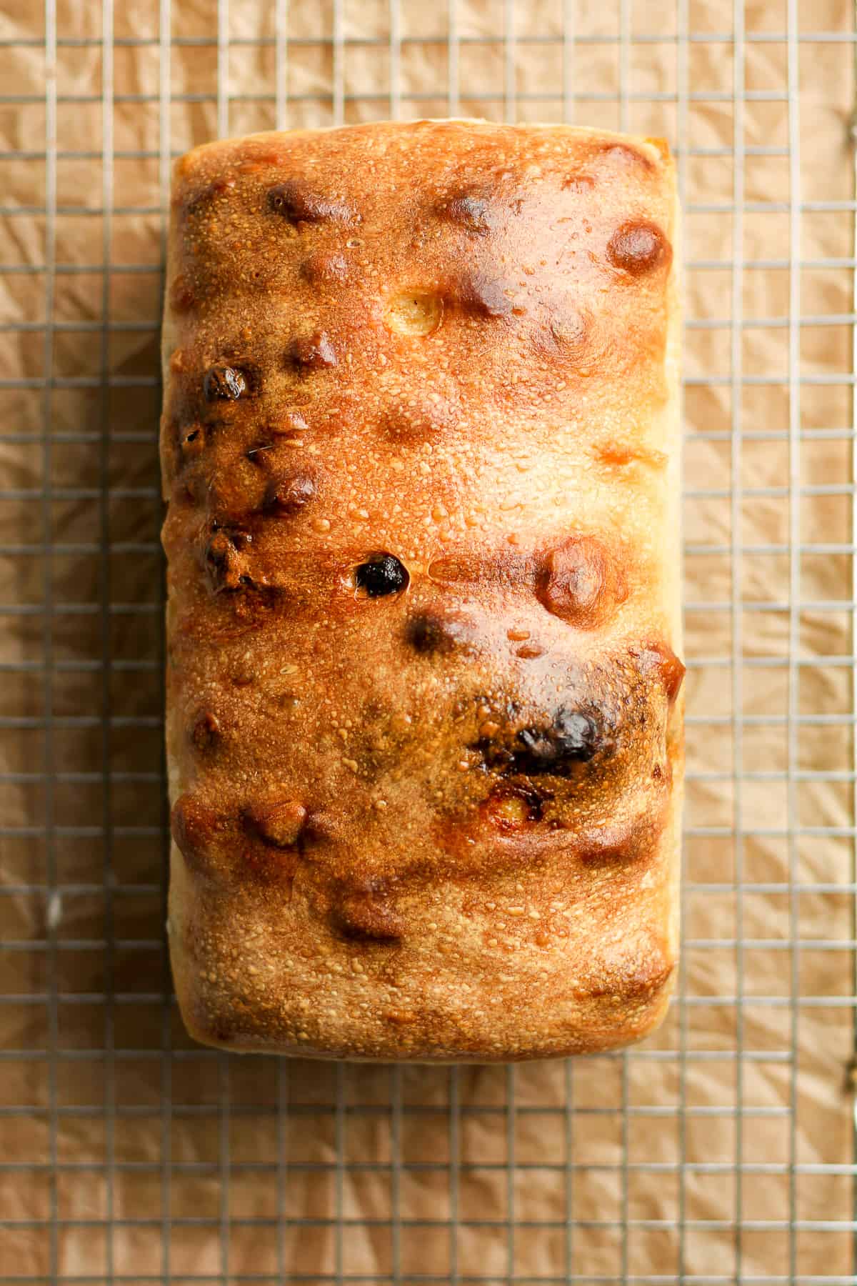 A loaf of the baked cinnamon raisin sourdough bread.
