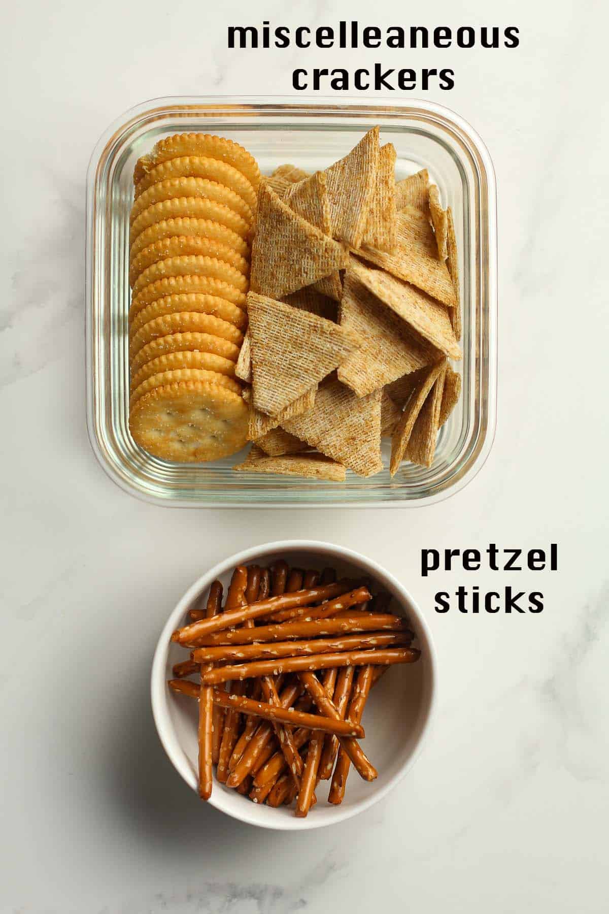 Bowls of crackers and pretzels