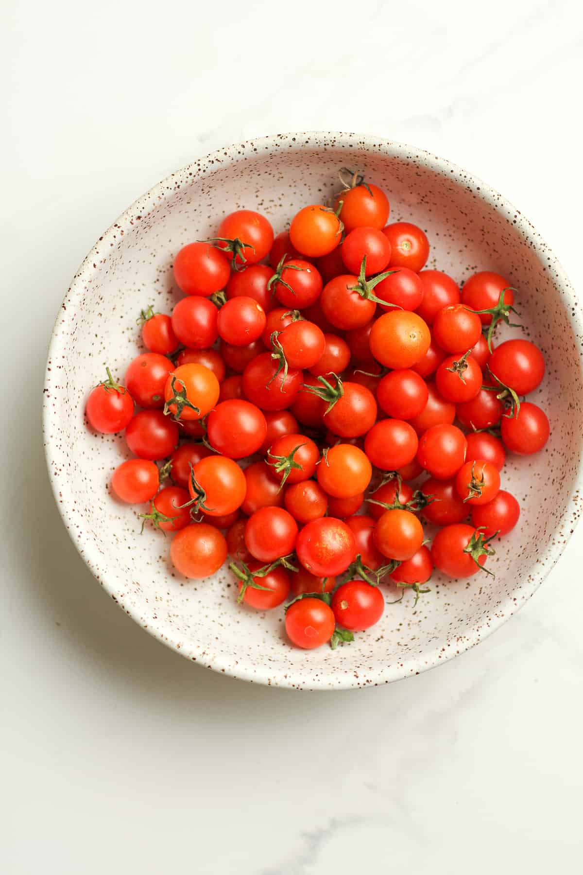 A bowl of garden fresh cherry tomatoes.