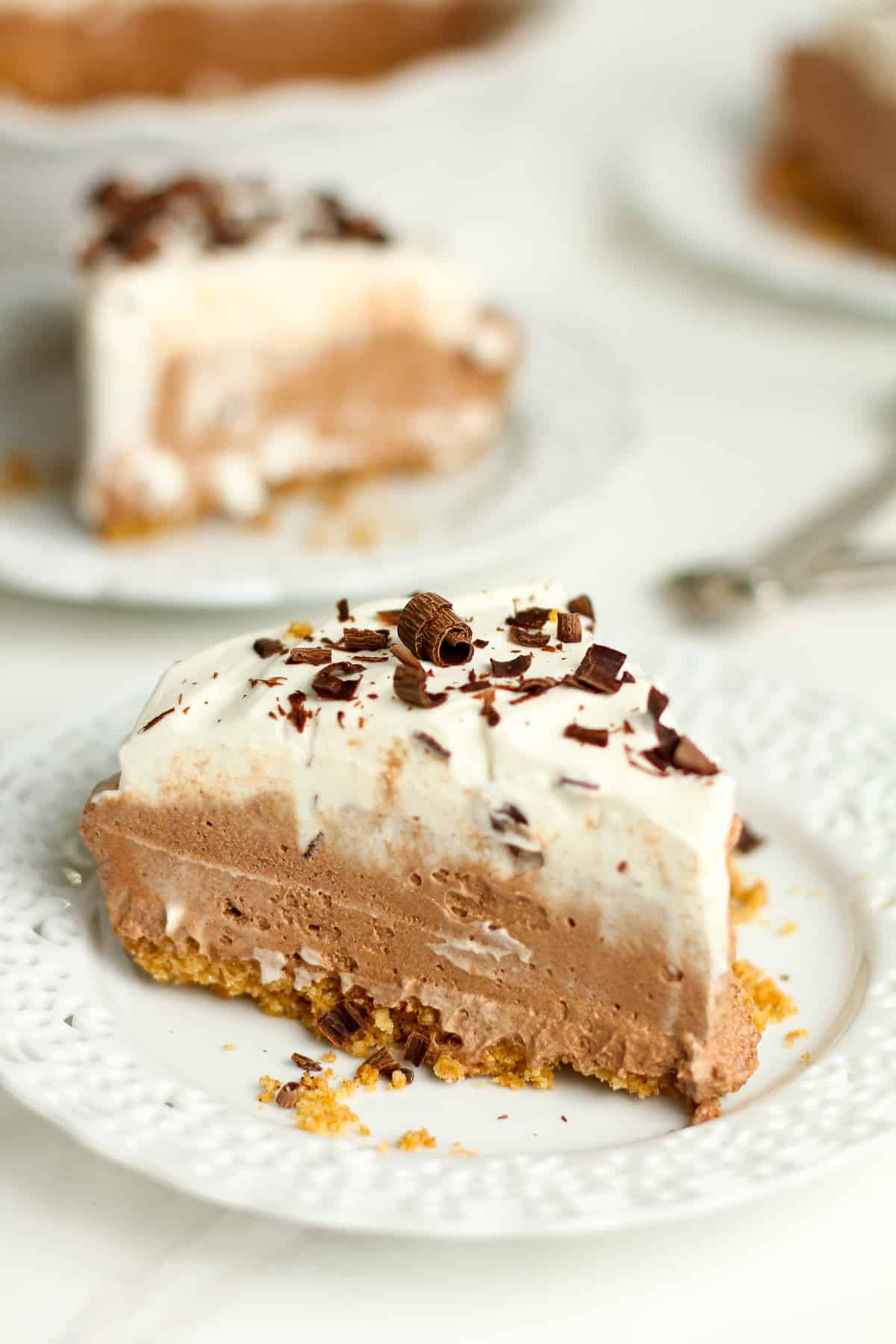 Side view of several slices of French silk pie.