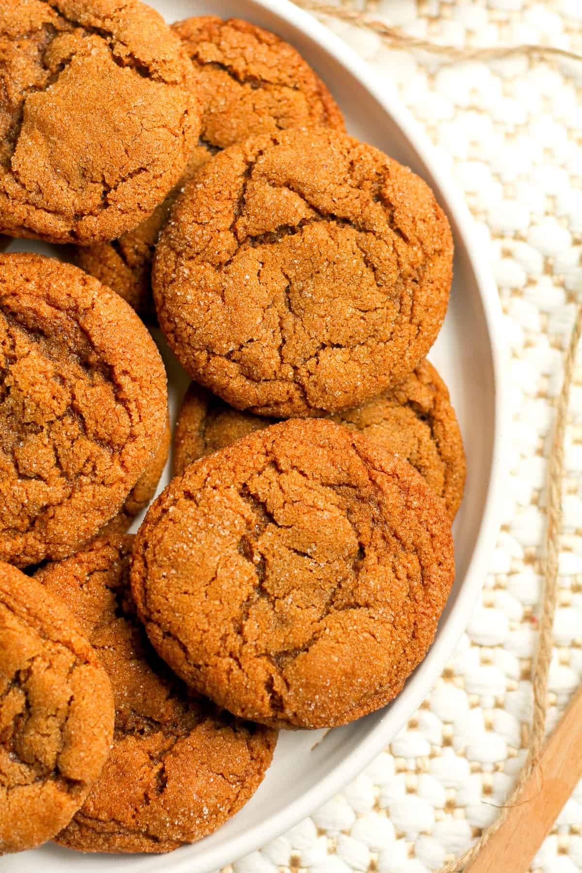 A partial plate of gingersnap cookies.