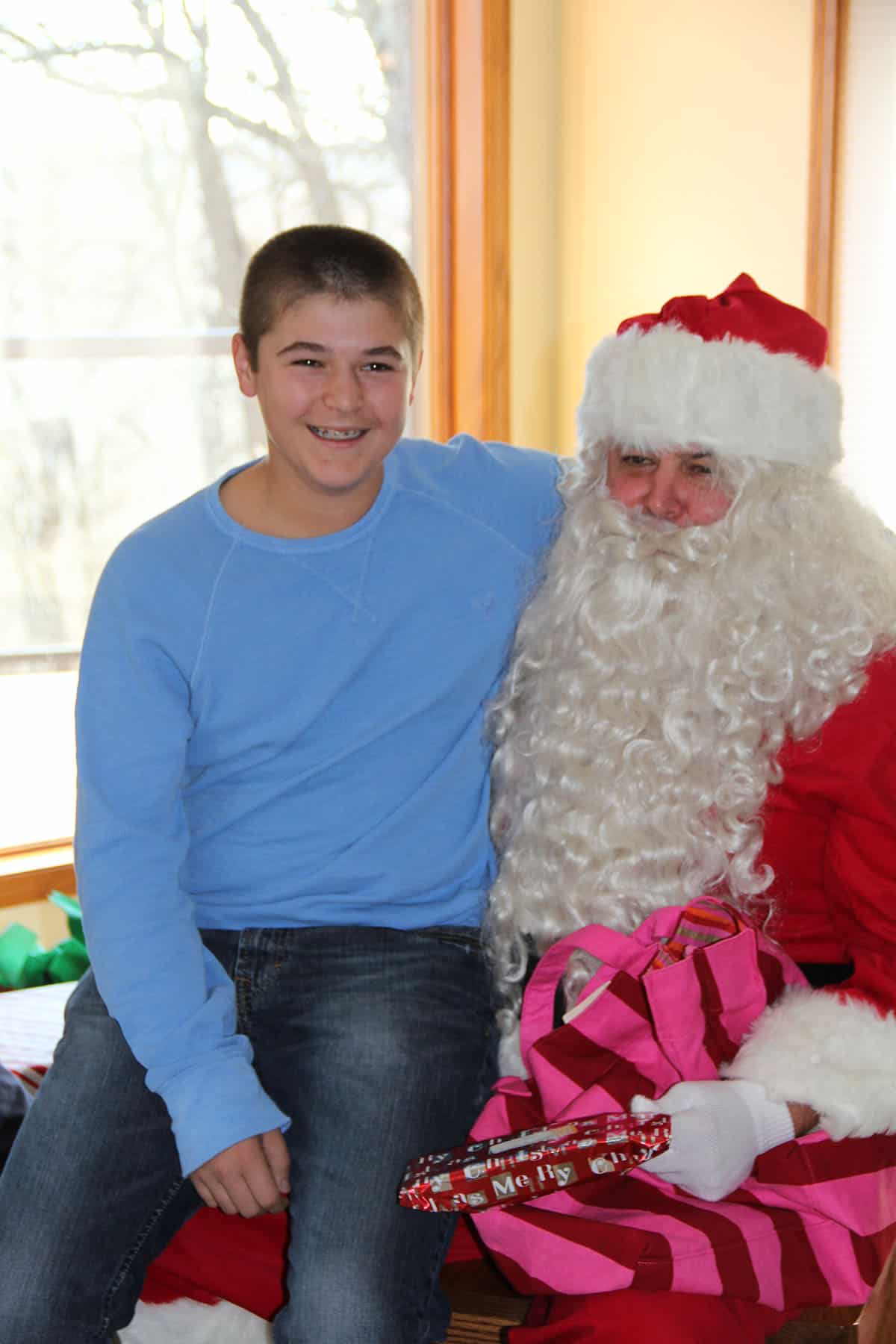 Josh sitting on Santa's lap.