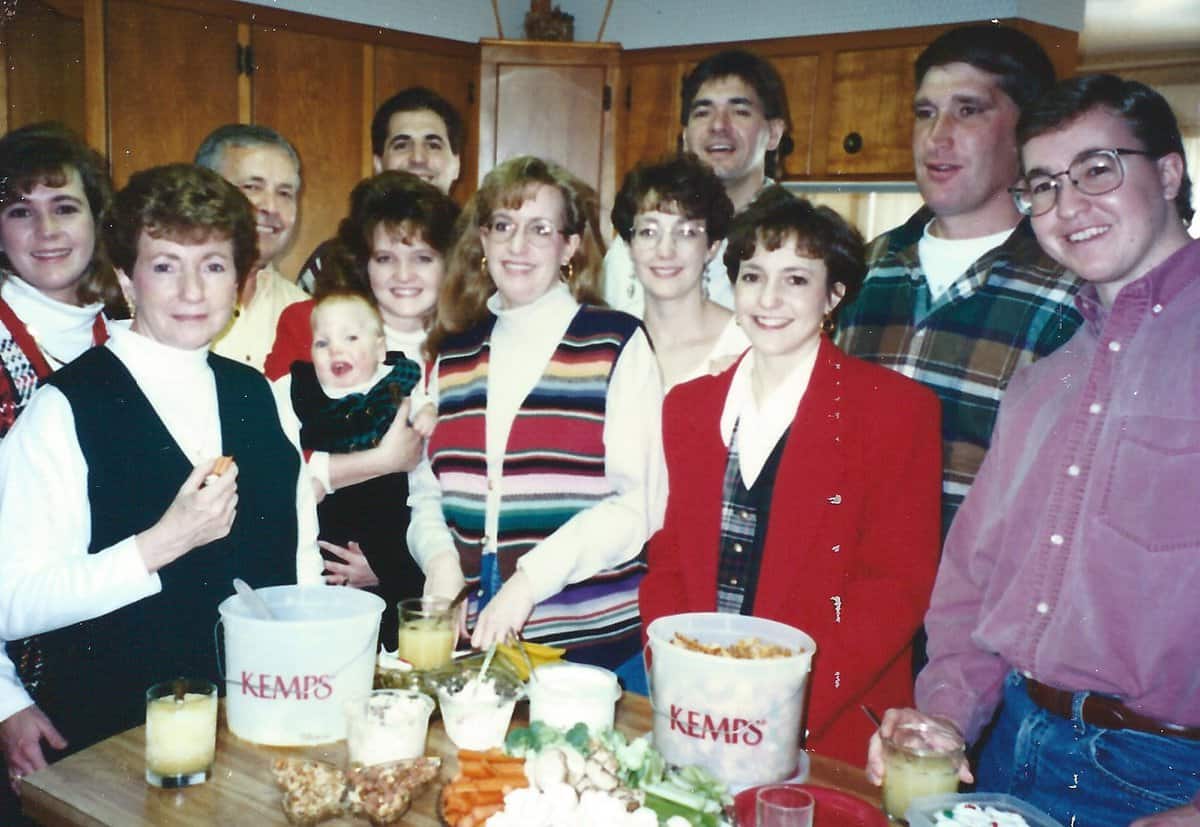 A bunch of the Reding gang gathered around the kitchen bar loaded with food and slush.