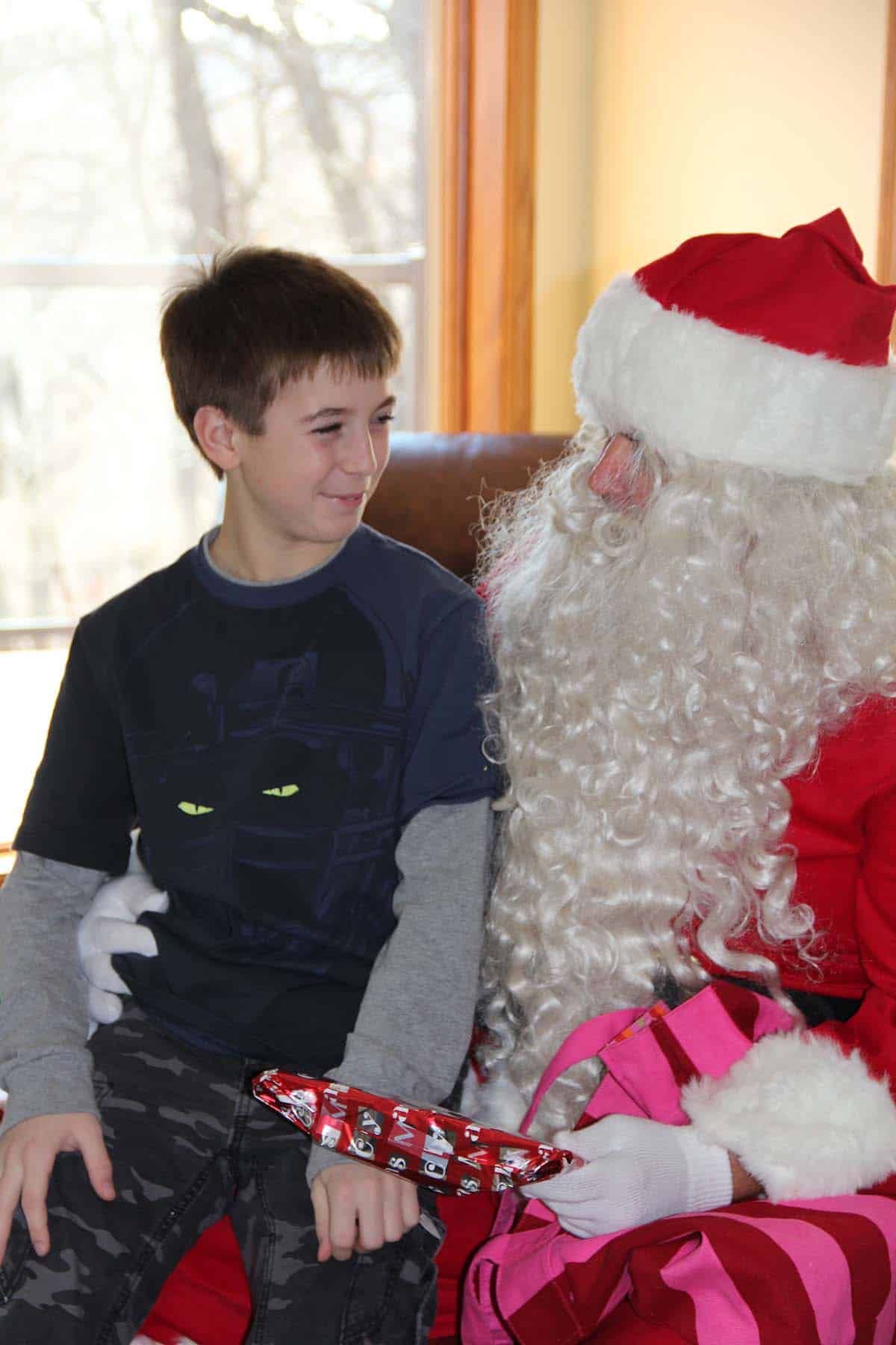 Zach sitting on Santa's lap.