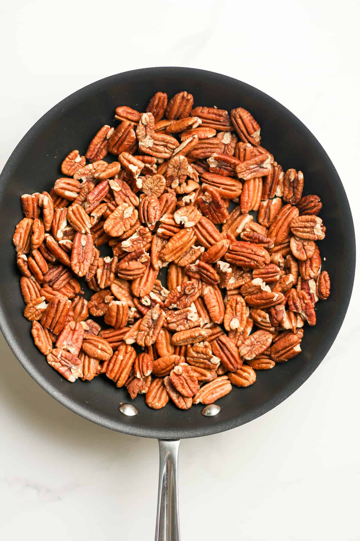 A pan of toasted pecans.