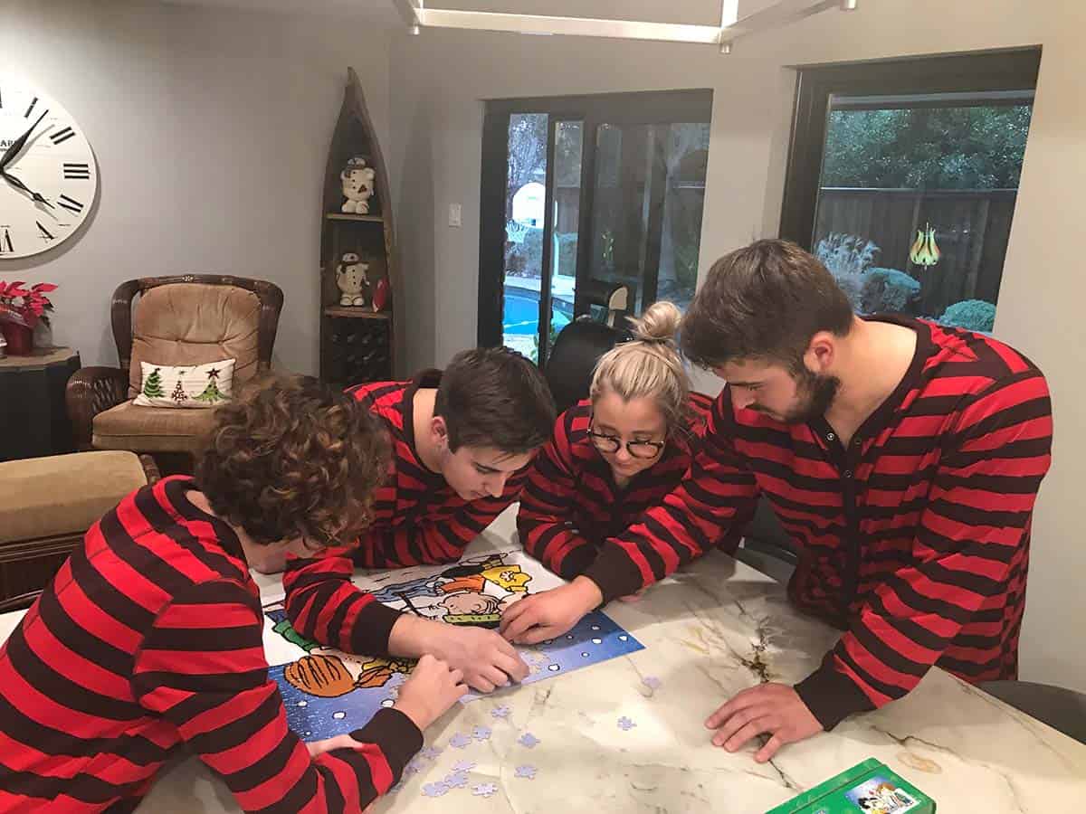 Kids working on puzzle.