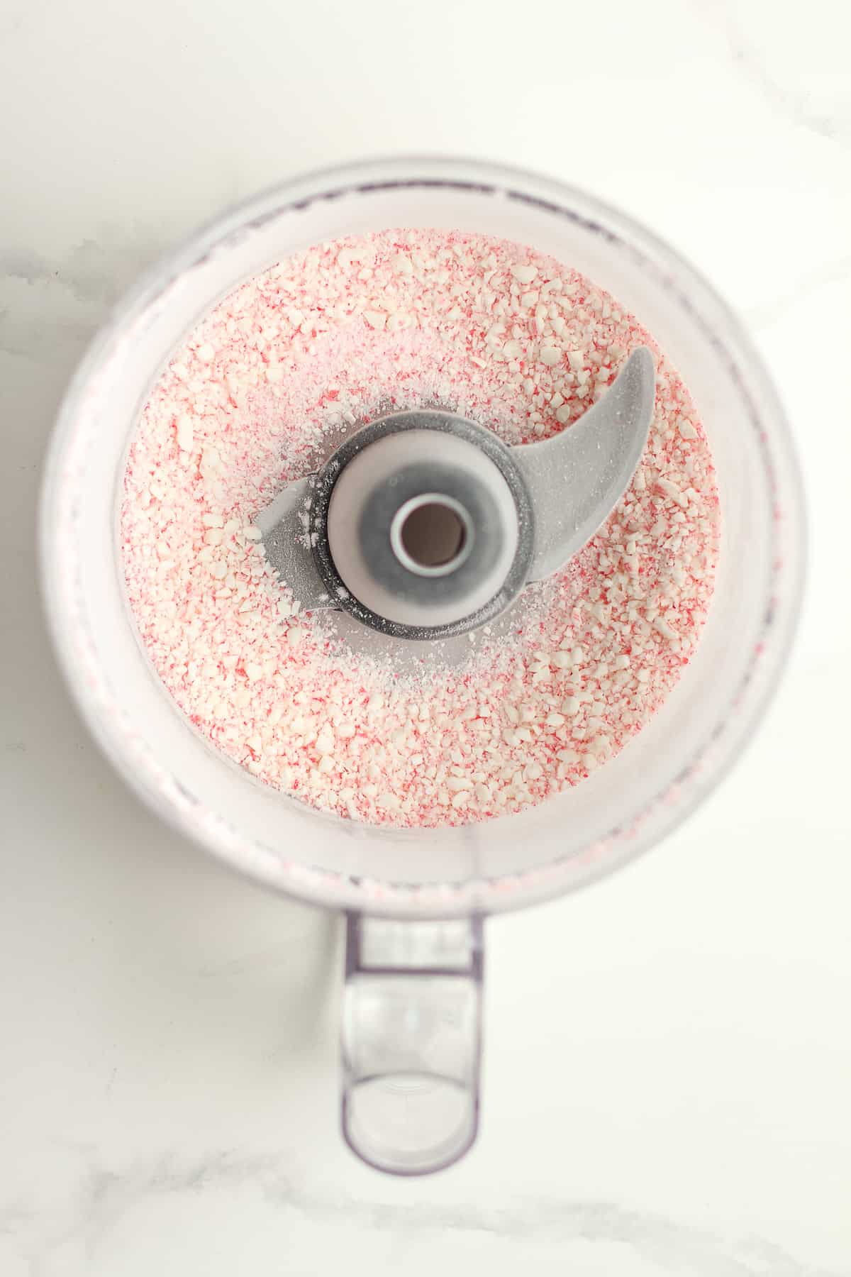 A food processor of crushed peppermint.