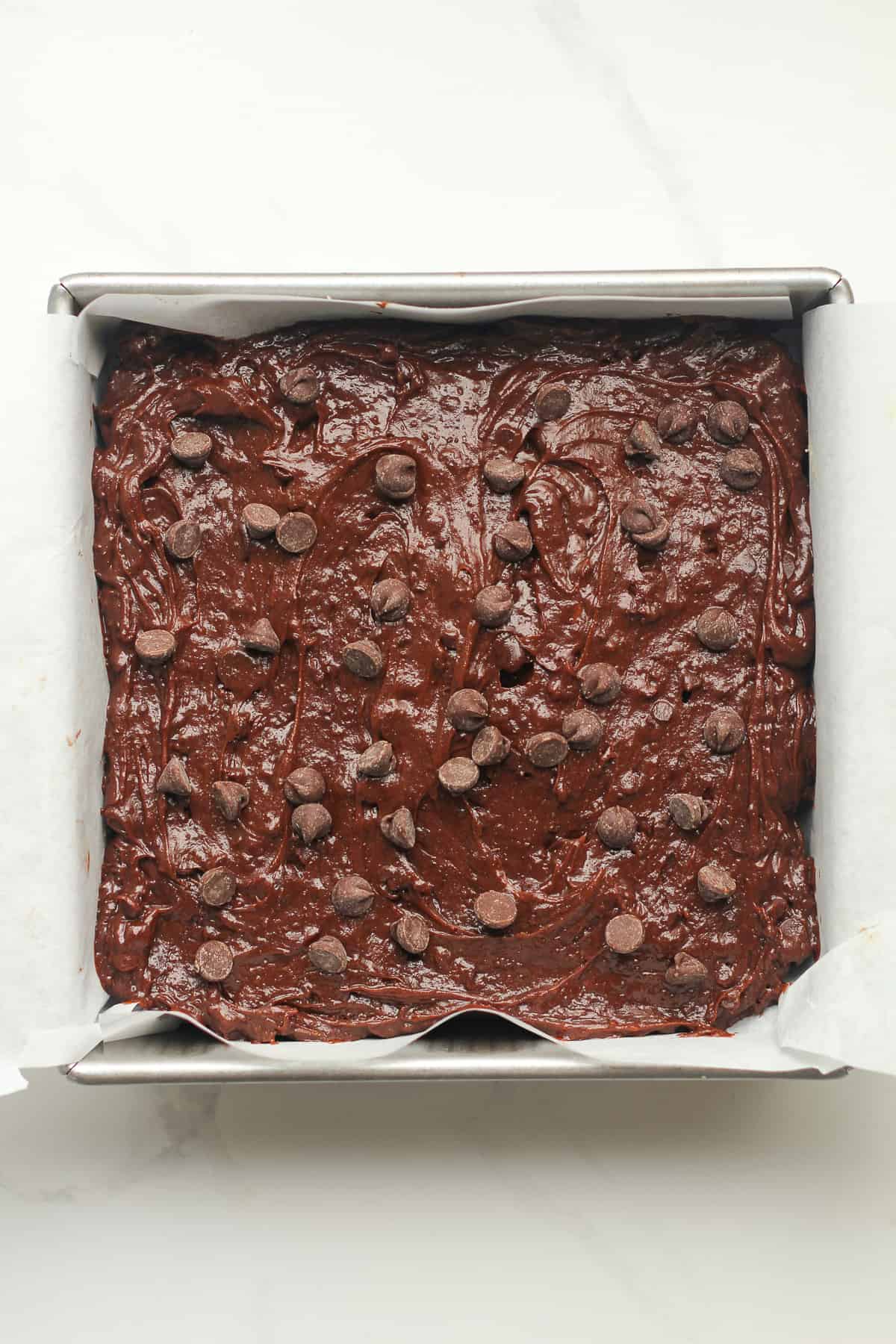 The pan with the brownie layer on top (layer 3).