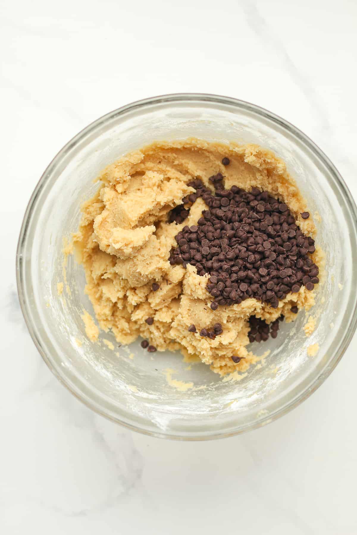 A bowl of the cookie dough for the bars.