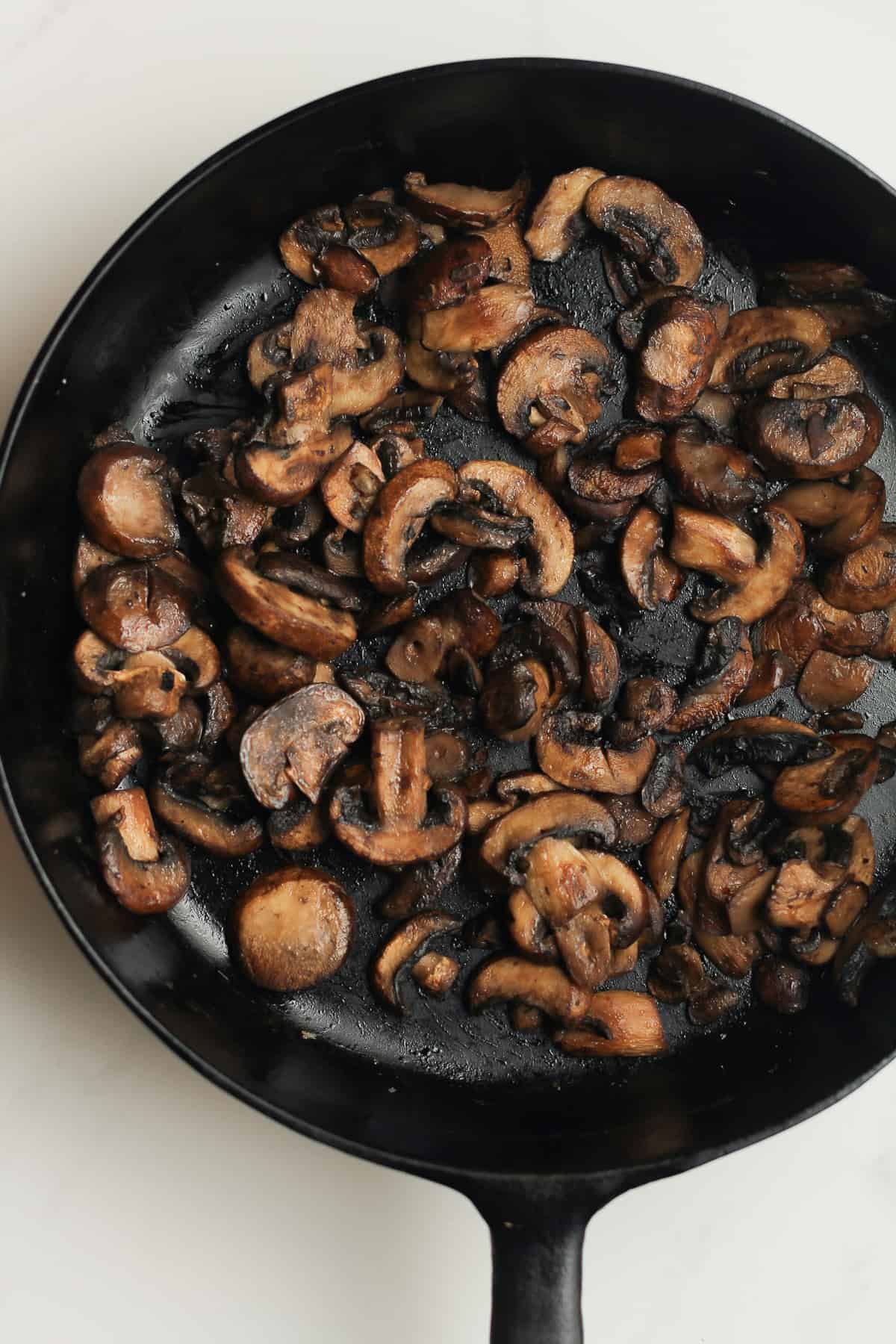 A skillet of sautéed mushrooms.