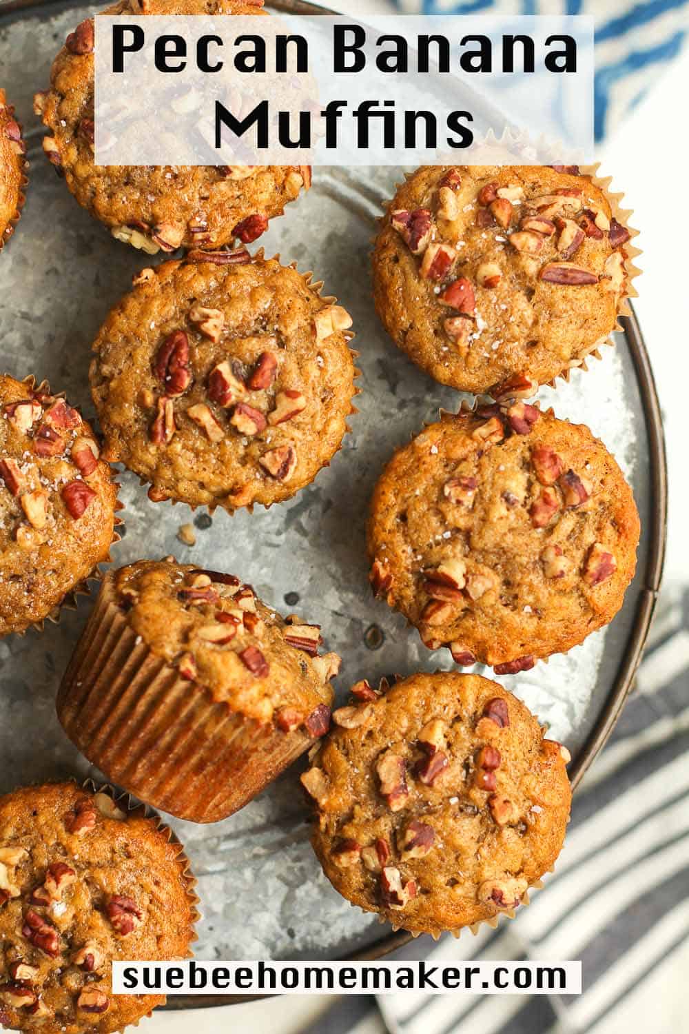 A platter of pecan banana muffins with pecans on top.