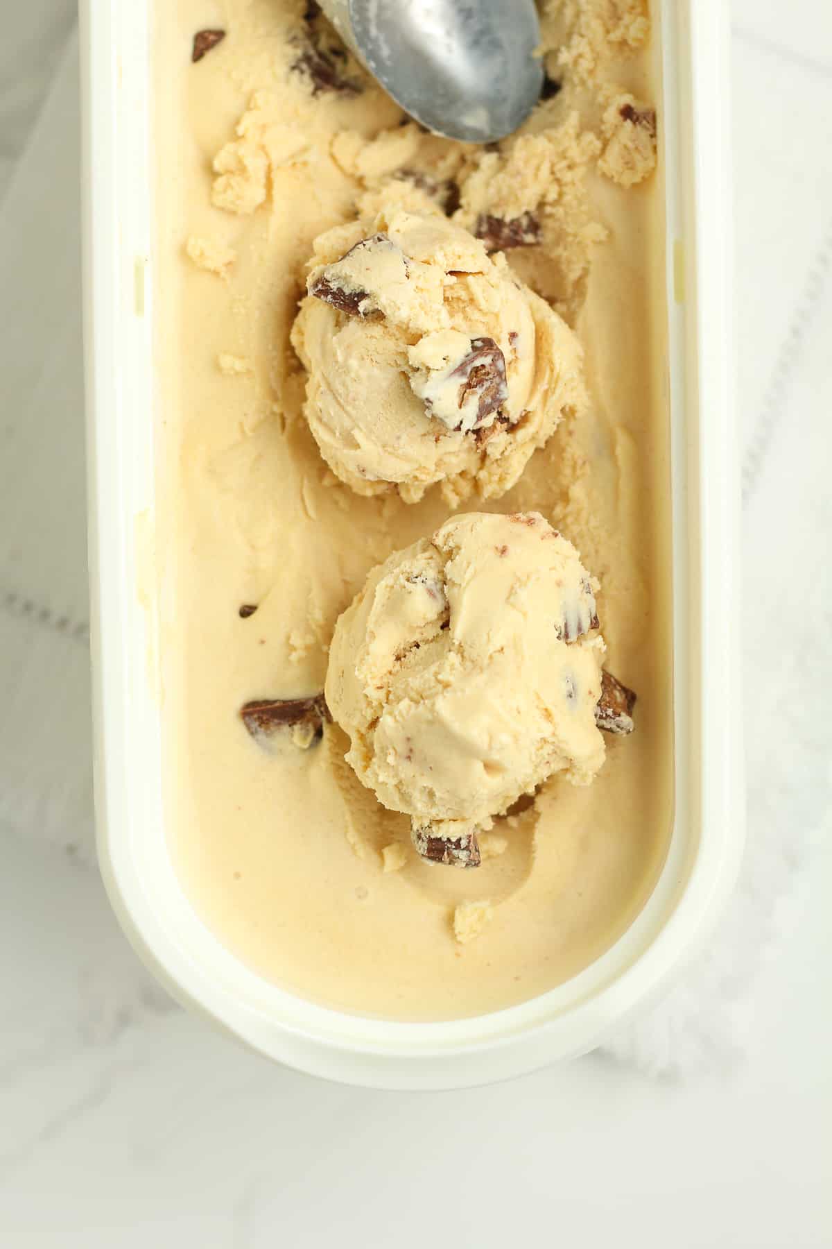 Closeup on a container of peanut butter ice cream.