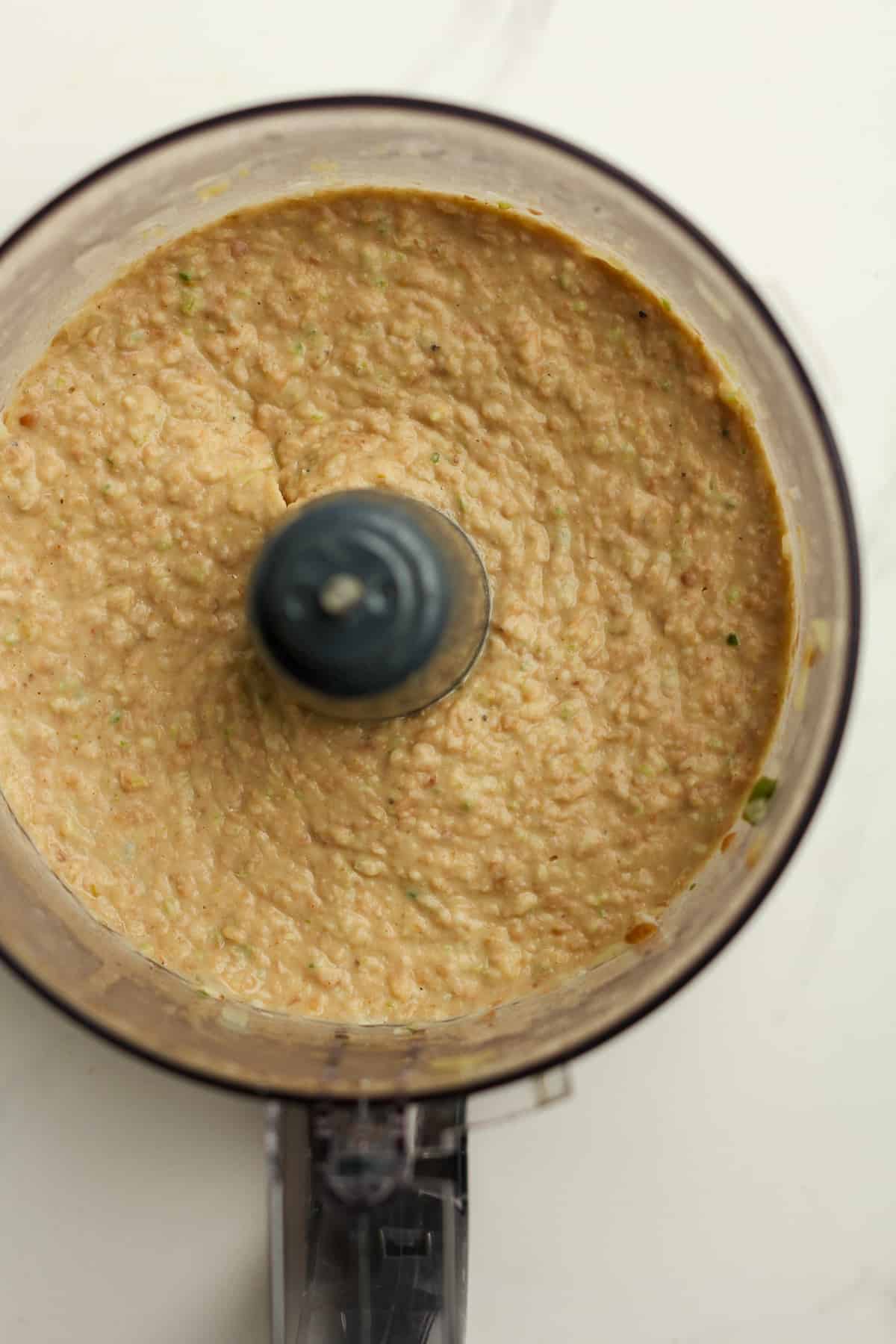 A food processor of the pureed refried beans.
