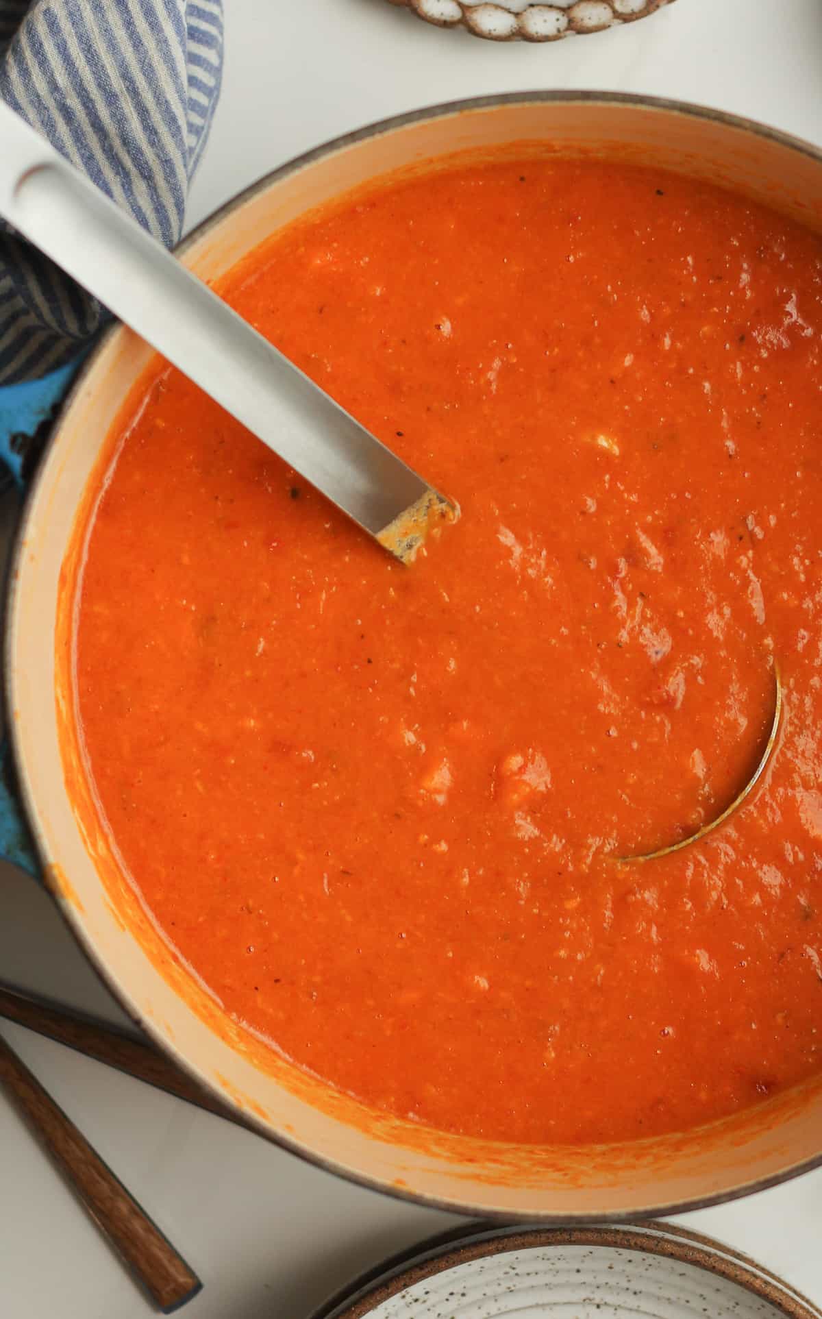 Closeup on a pot of sweet potato curry soup.