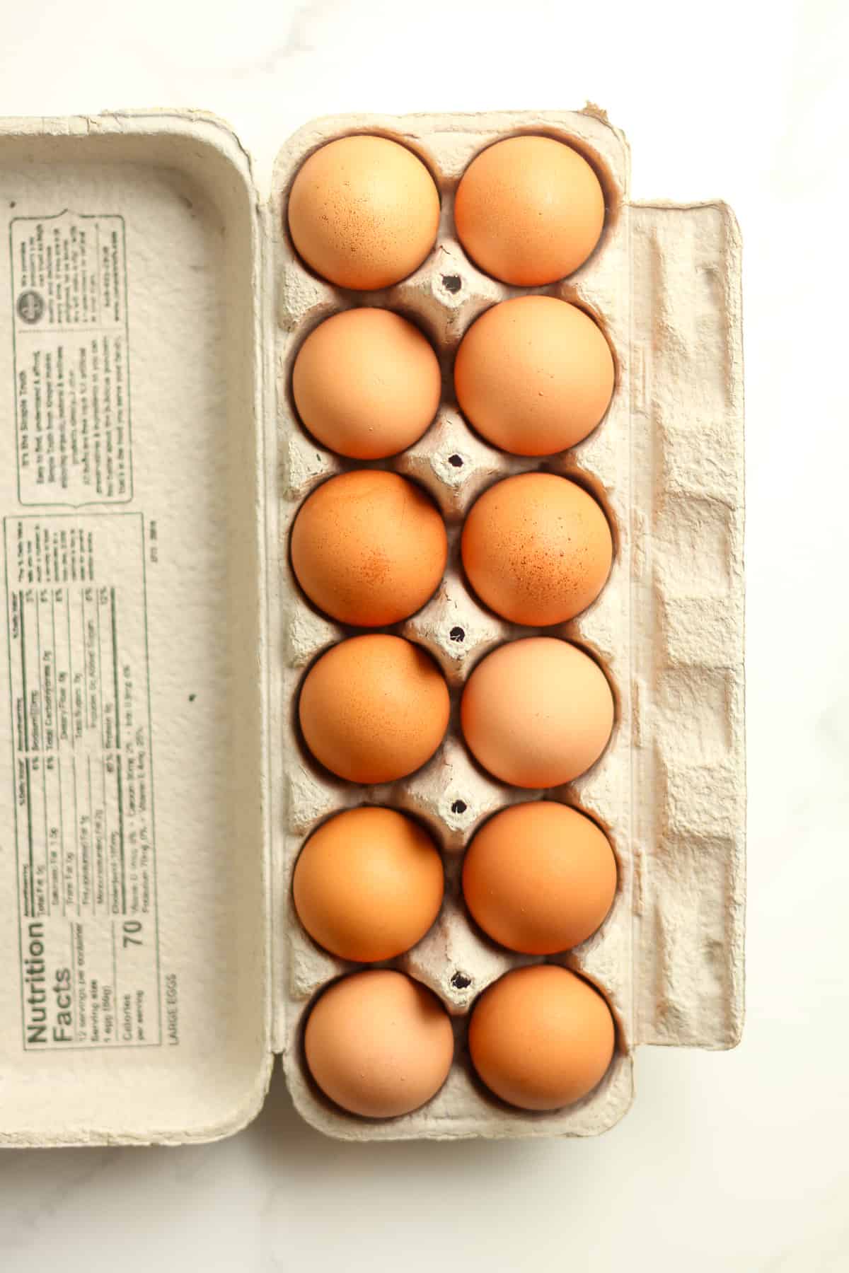 A 12 pack of cage free eggs.