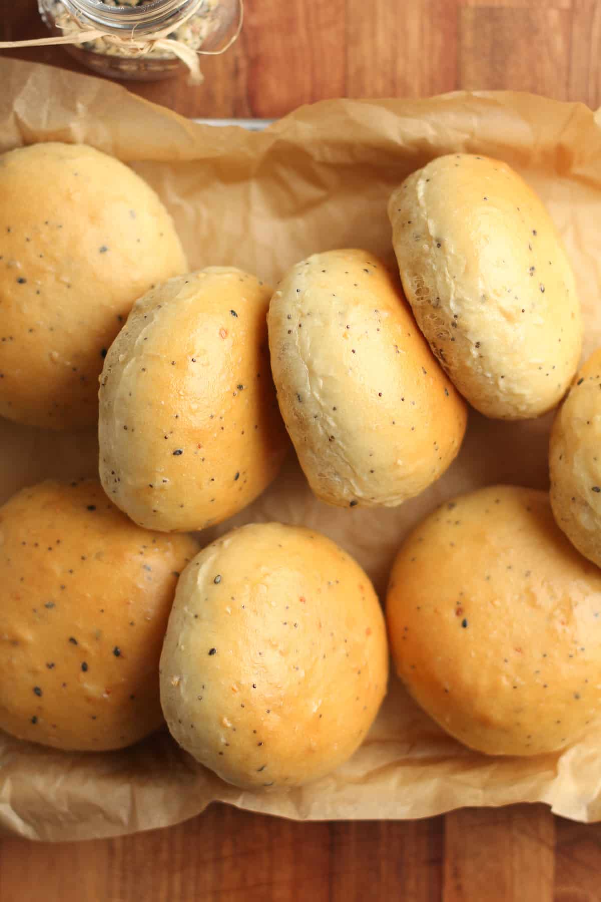 Side view of a small pan of bagel rolls.