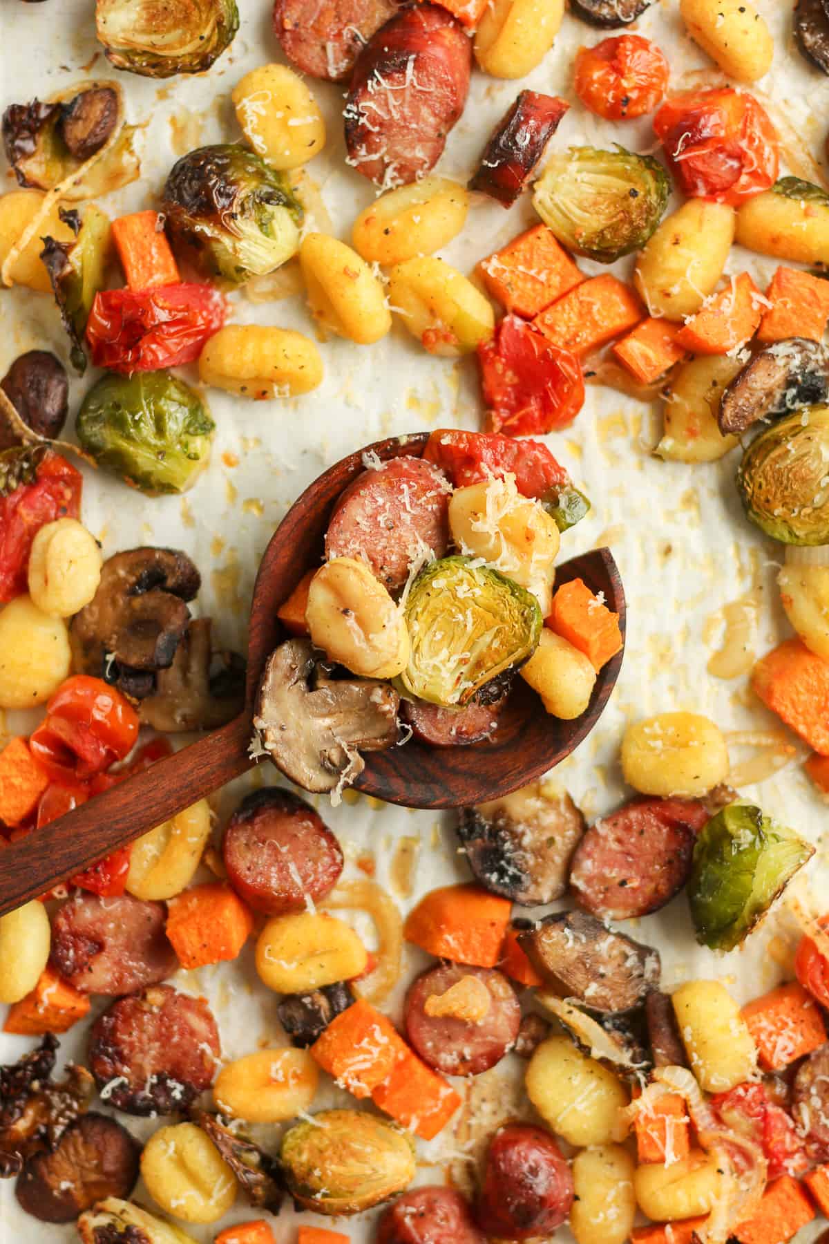 Overhead shot of a spoonful of the gnocchi and veggies.