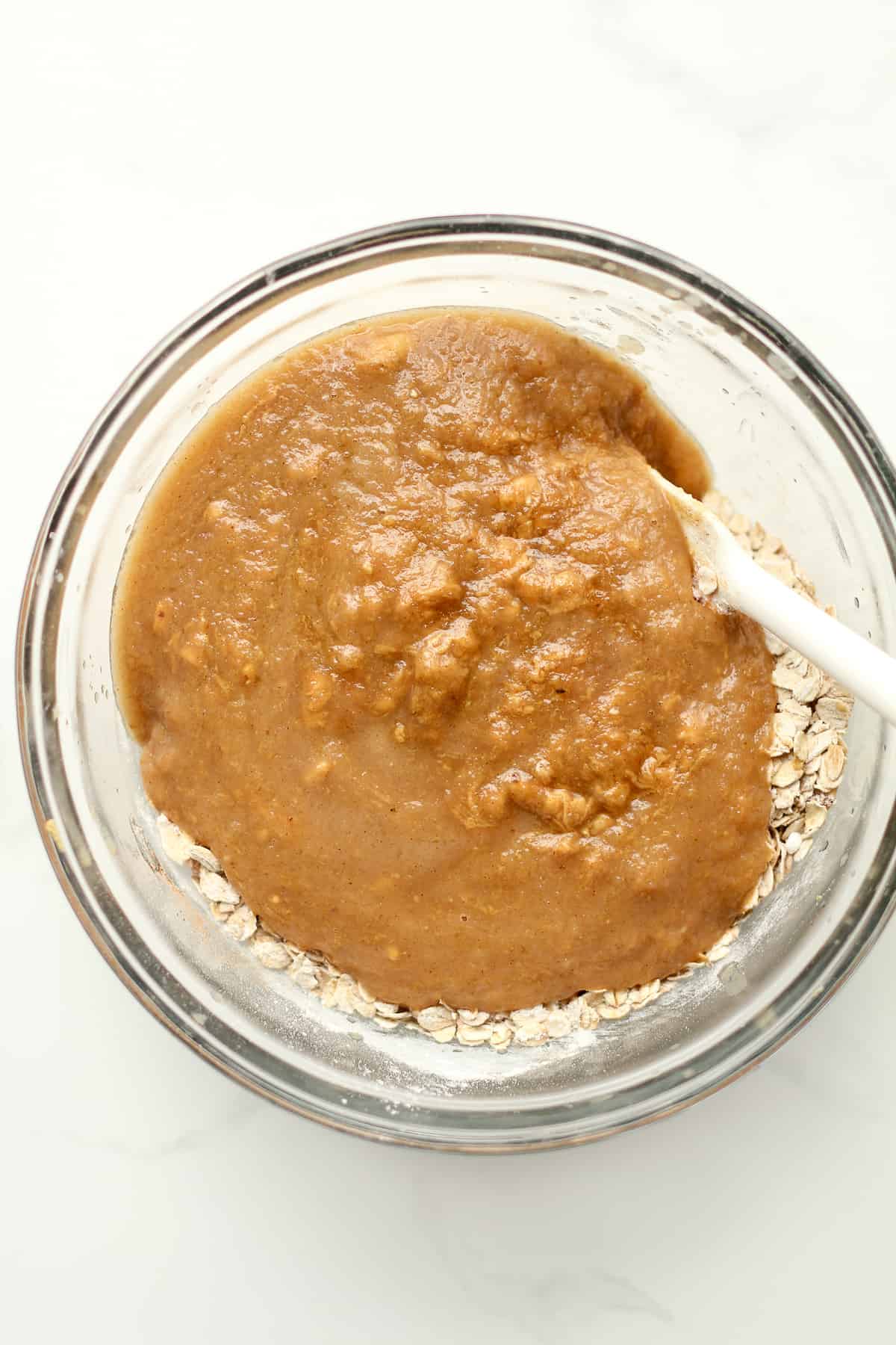 A bowl of the dry ingredients with the wet on top.