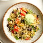 A serving of the Mexican quinoa salad in a white bowl