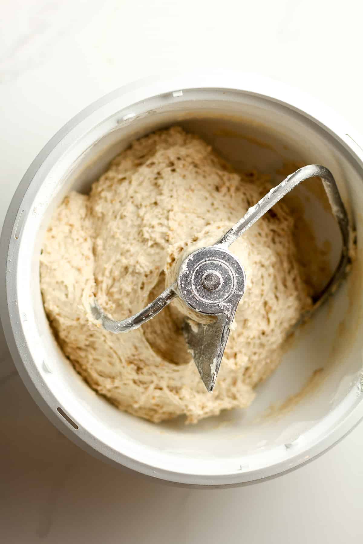 The mixer with the dough inside after adding all the flour.