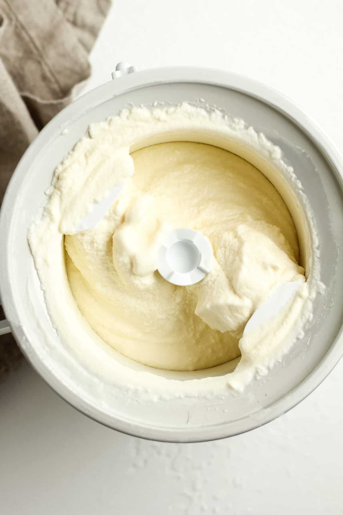 A Kitchenaid bowl of the just made vanilla ice cream base.