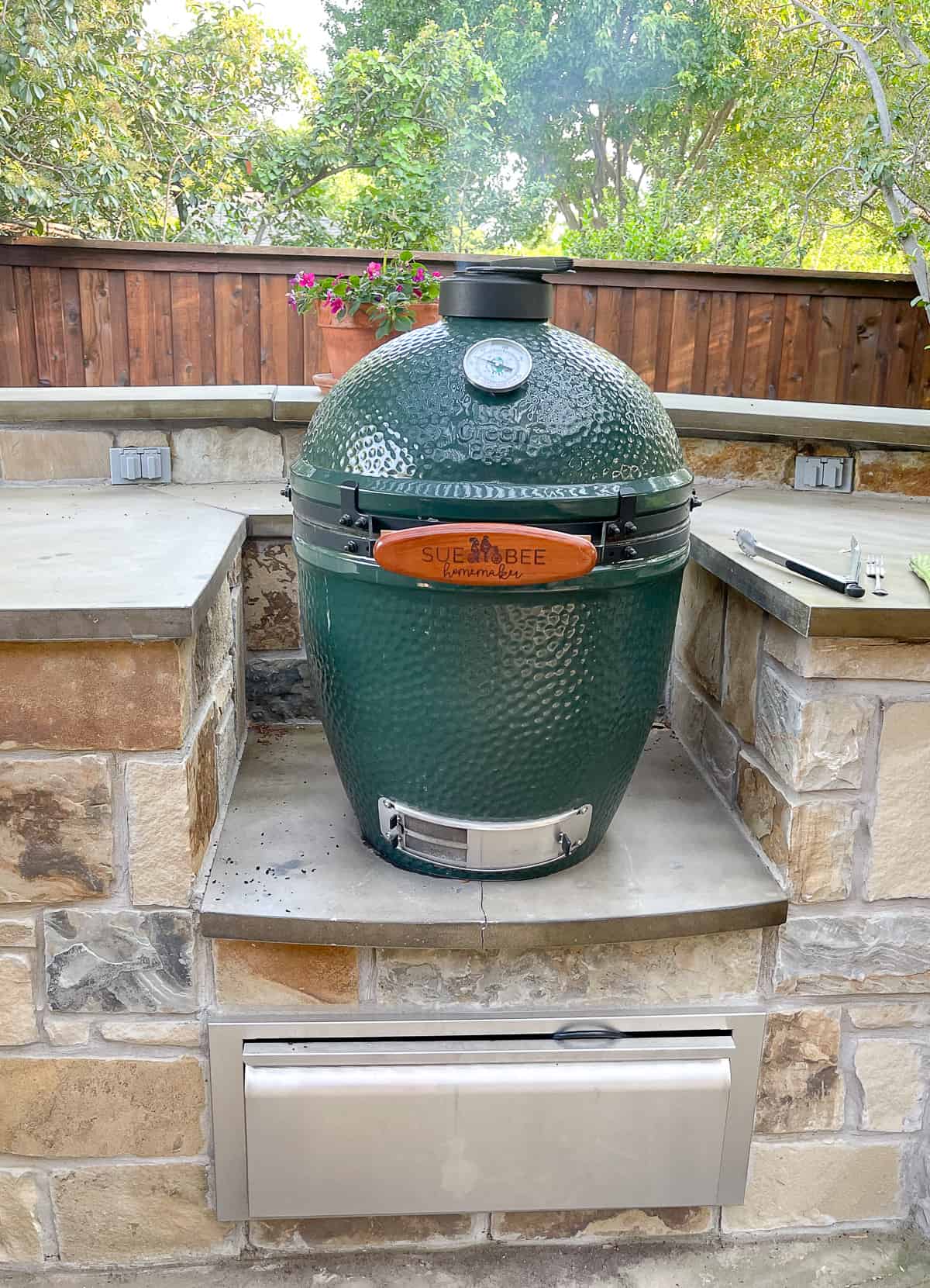Side shot of a Big Green Egg in our backyard.