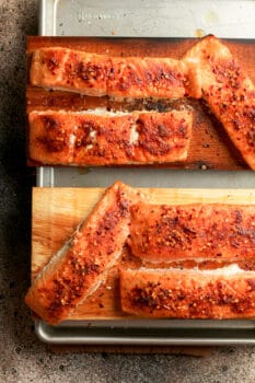 A pan with the cedar planks of salmon.