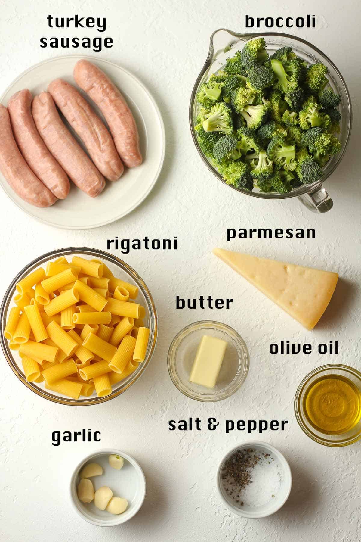 The ingredients for rigatoni with broccoli and sausage.