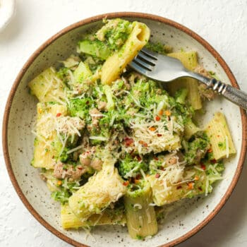 A serving of the broccoli pasta, with a fork.