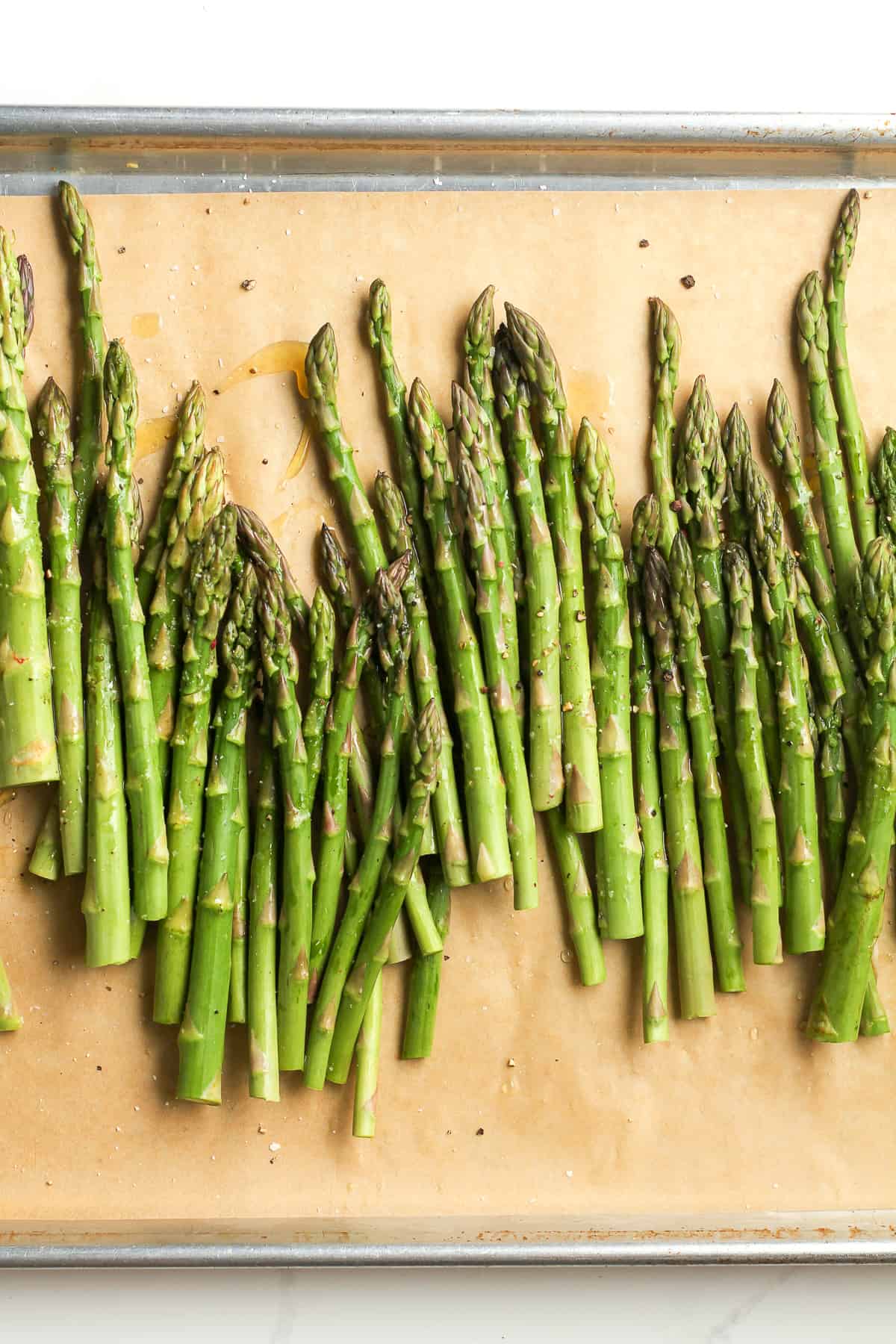 A pan of raw asparagus.
