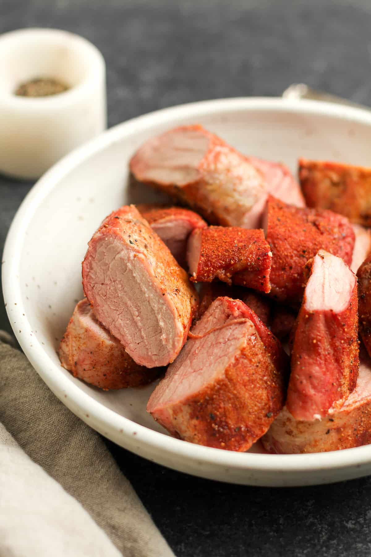 Side view of a bowl of smoked tenderloin.