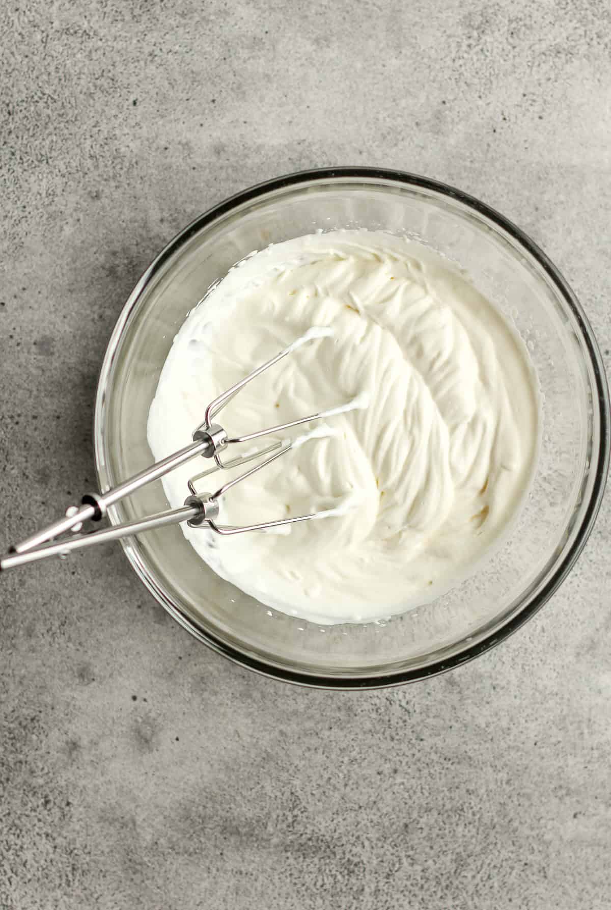 A bowl of the whipped heavy cream.