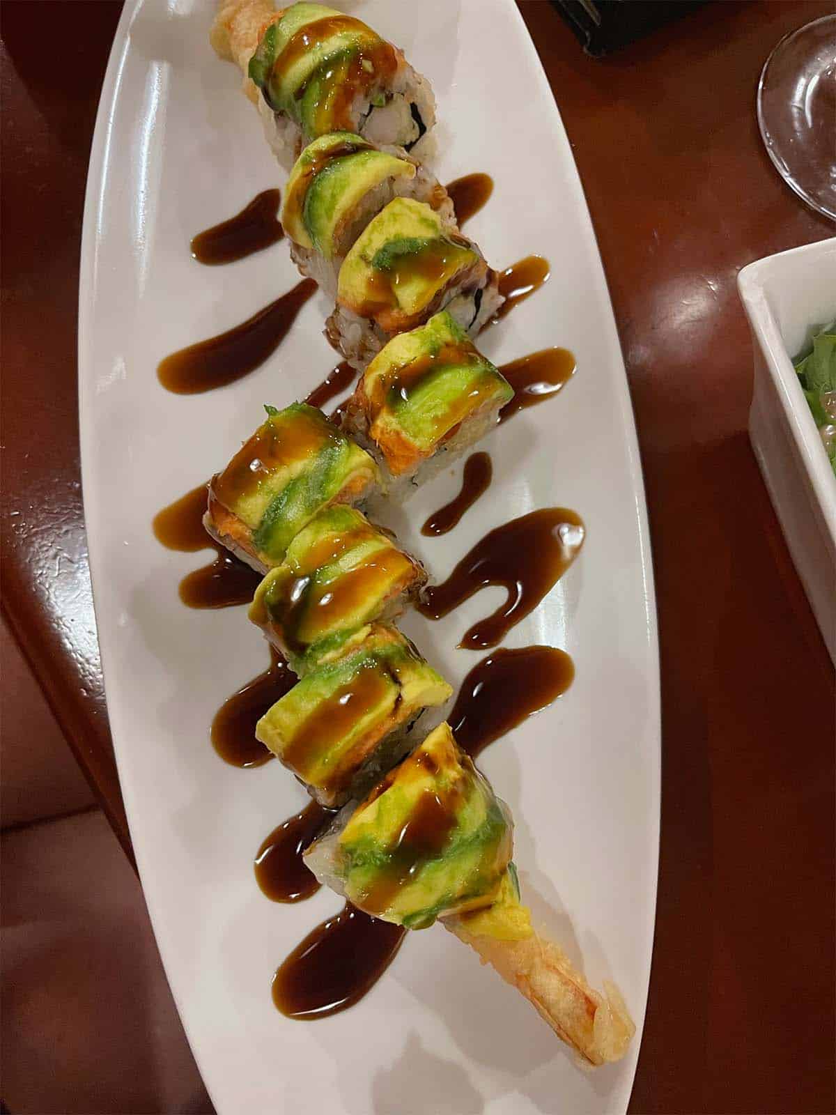 A plate of crispy sushi rolls.