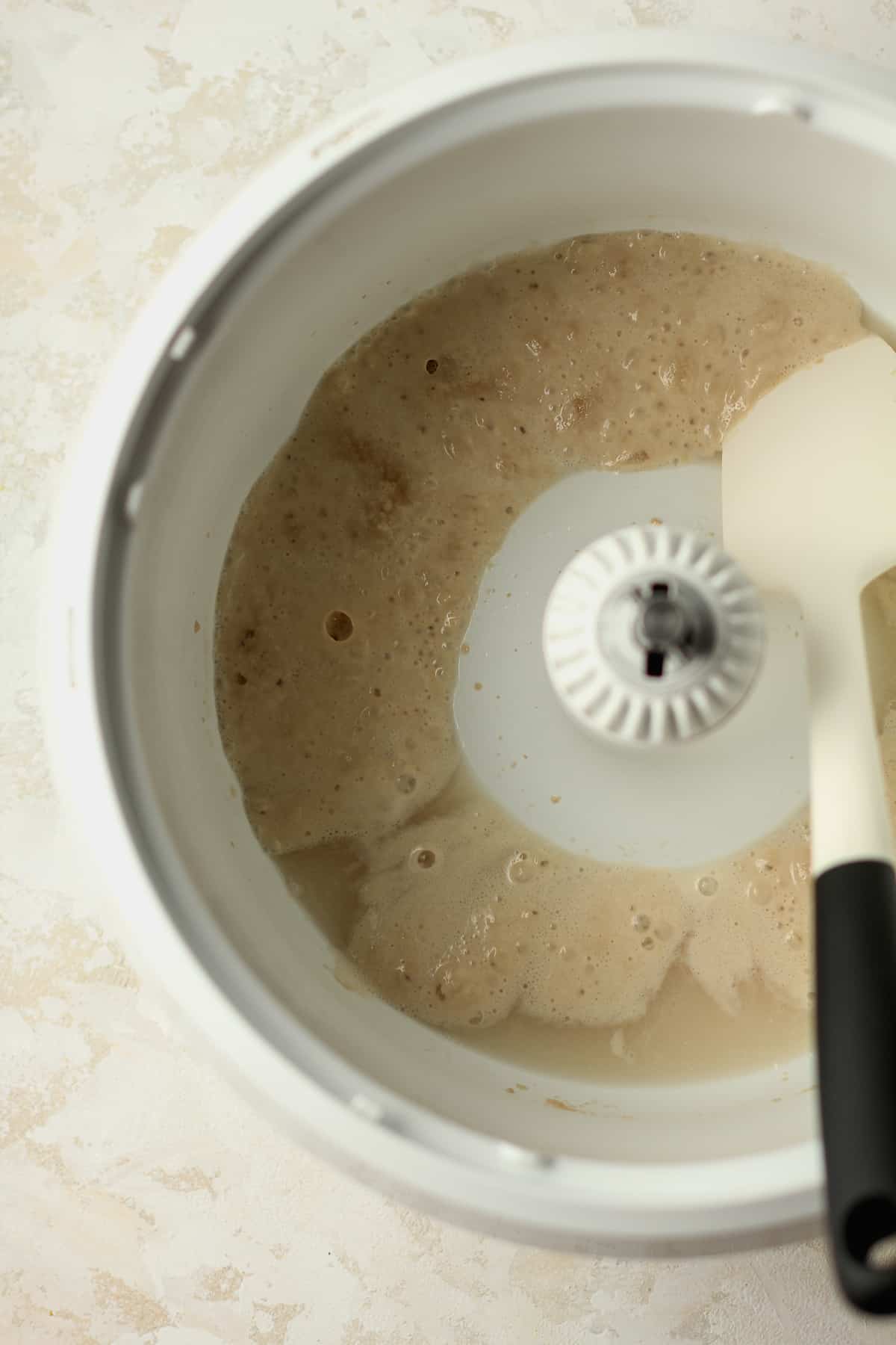 The bubbly yeast in a mixer.