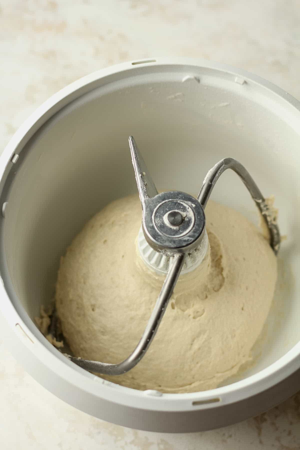 The naan dough in a mixer.