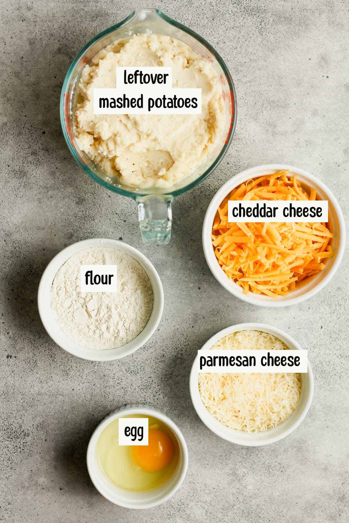 Bowls of the potato cake ingredients.