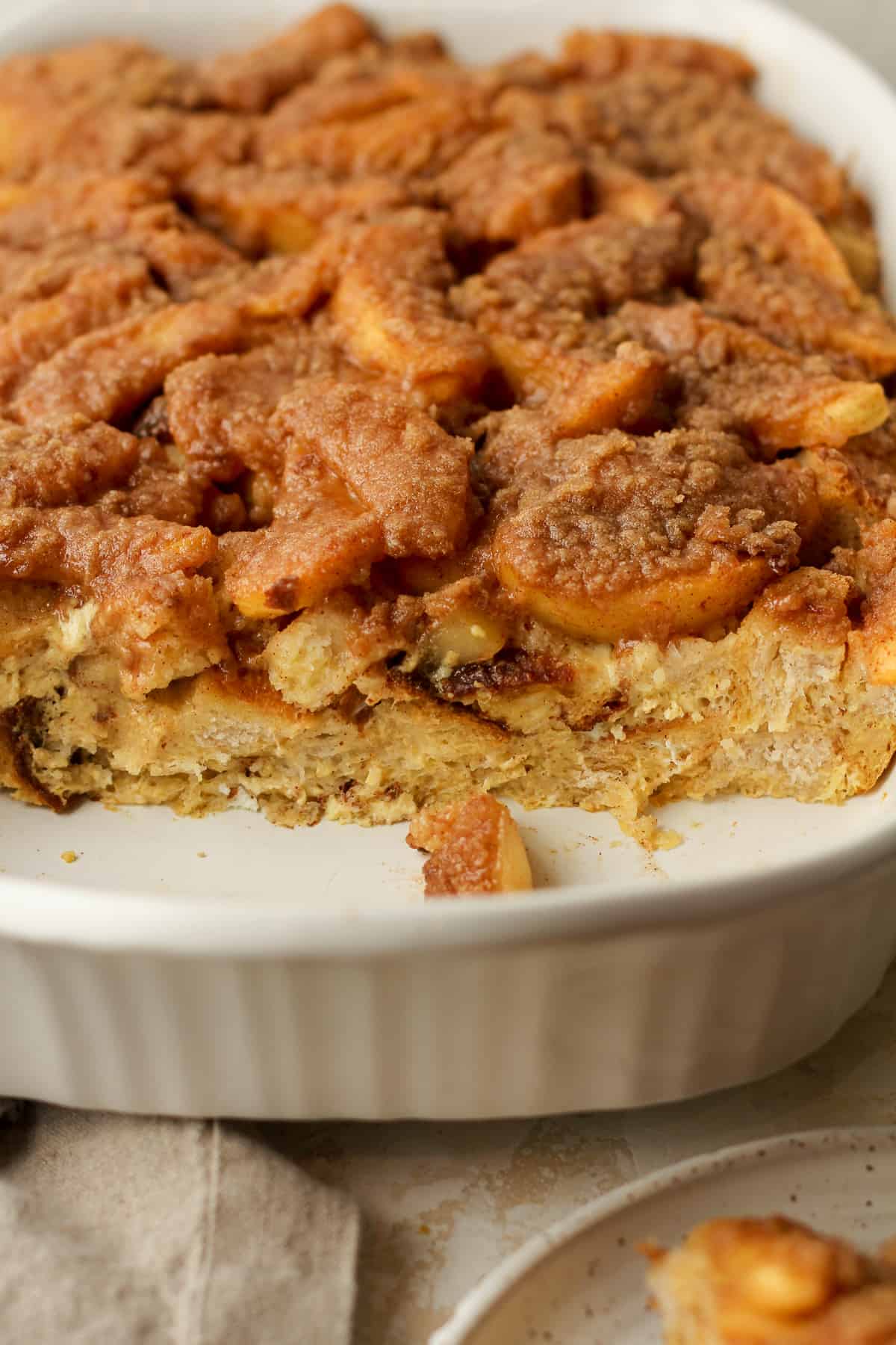 Side view of a partial French toast casserole showing the insides.
